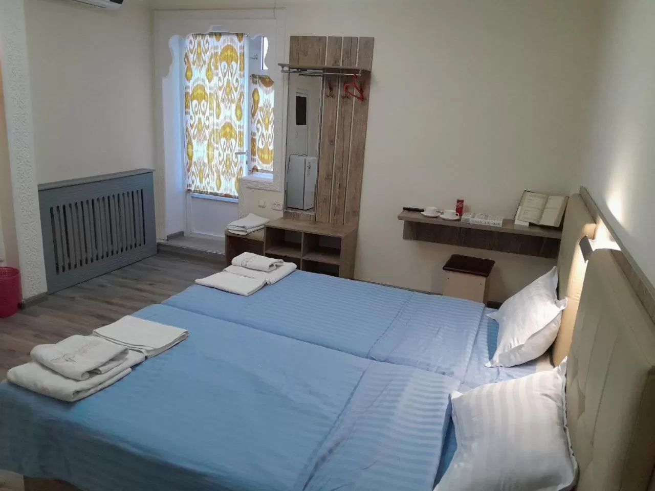 View (from property/room), Bed in Bukhara house hotel
