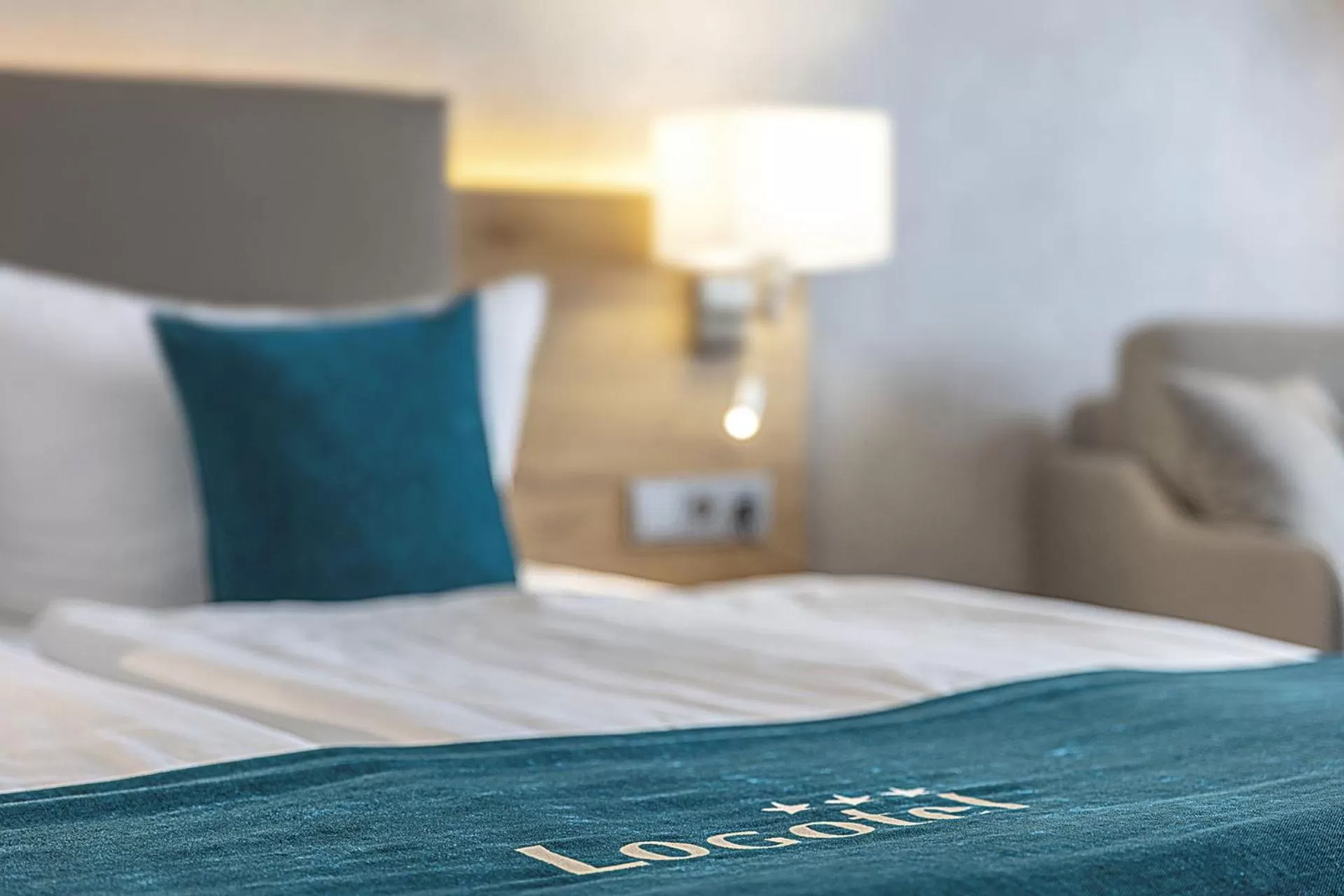 Bed in Hotel Logotel