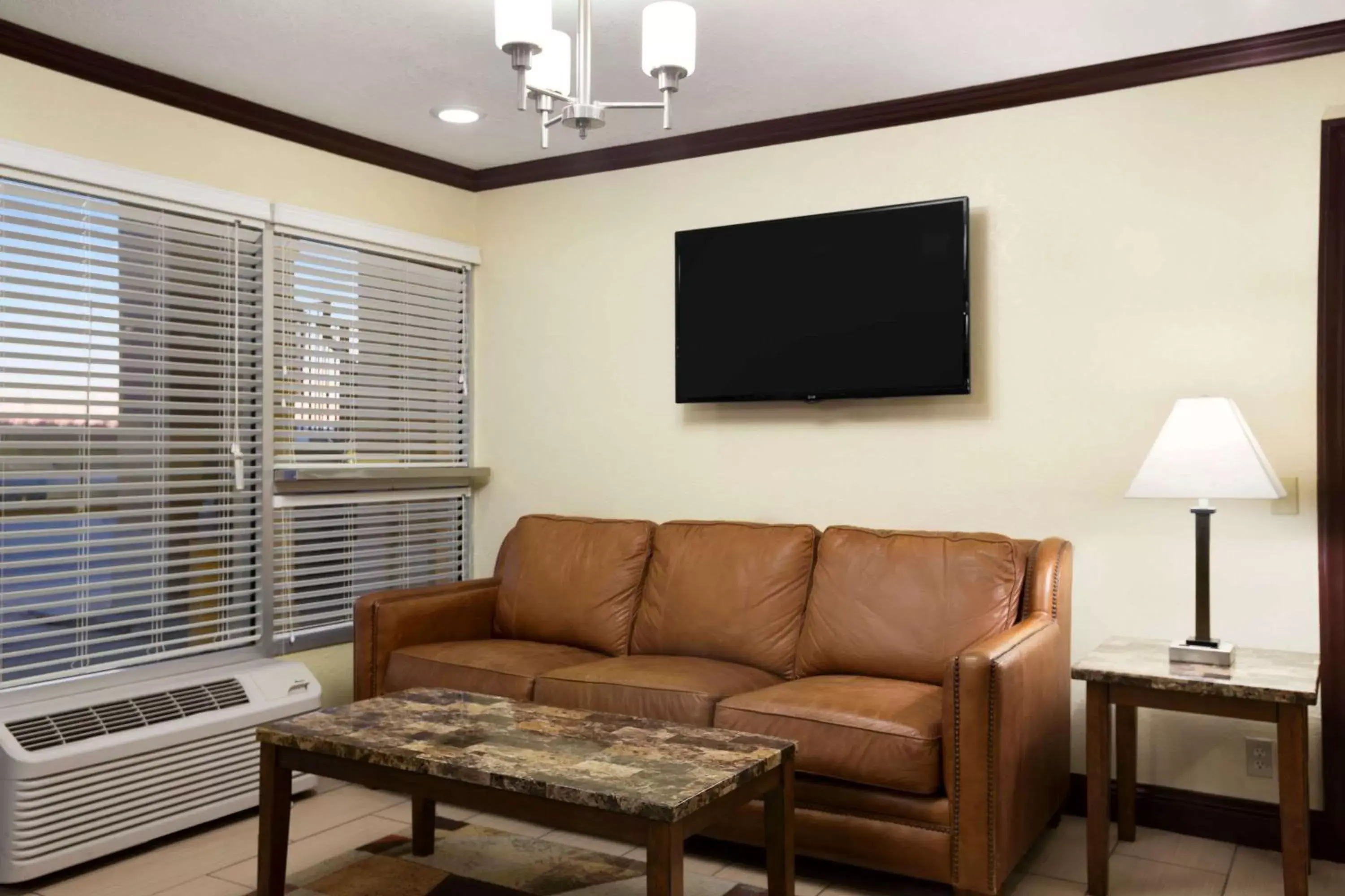 Lobby or reception in Super 8 by Wyndham Woodward Lobby or reception in Super 8 by Wyndham Woodward