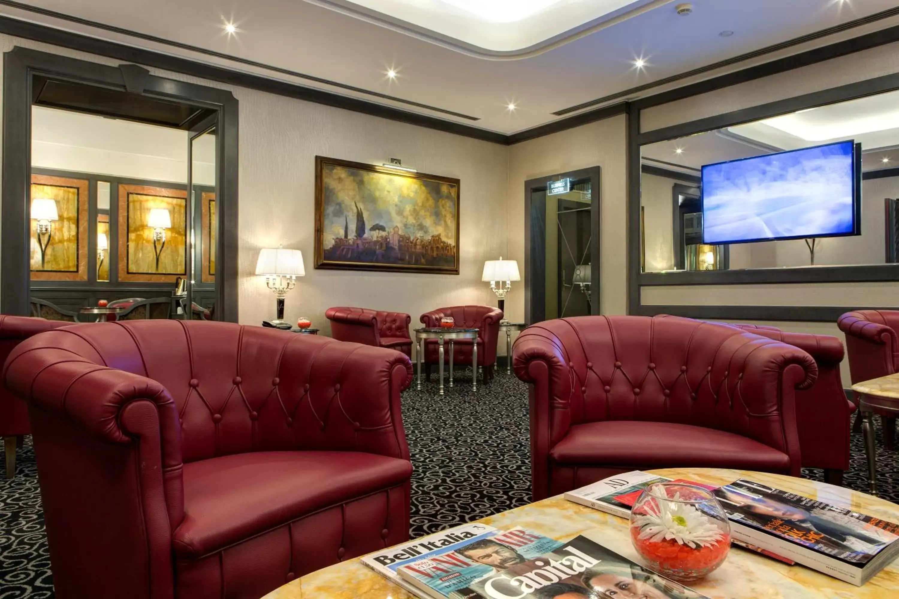 Communal lounge/ TV room, Seating Area in Hotel Artemide