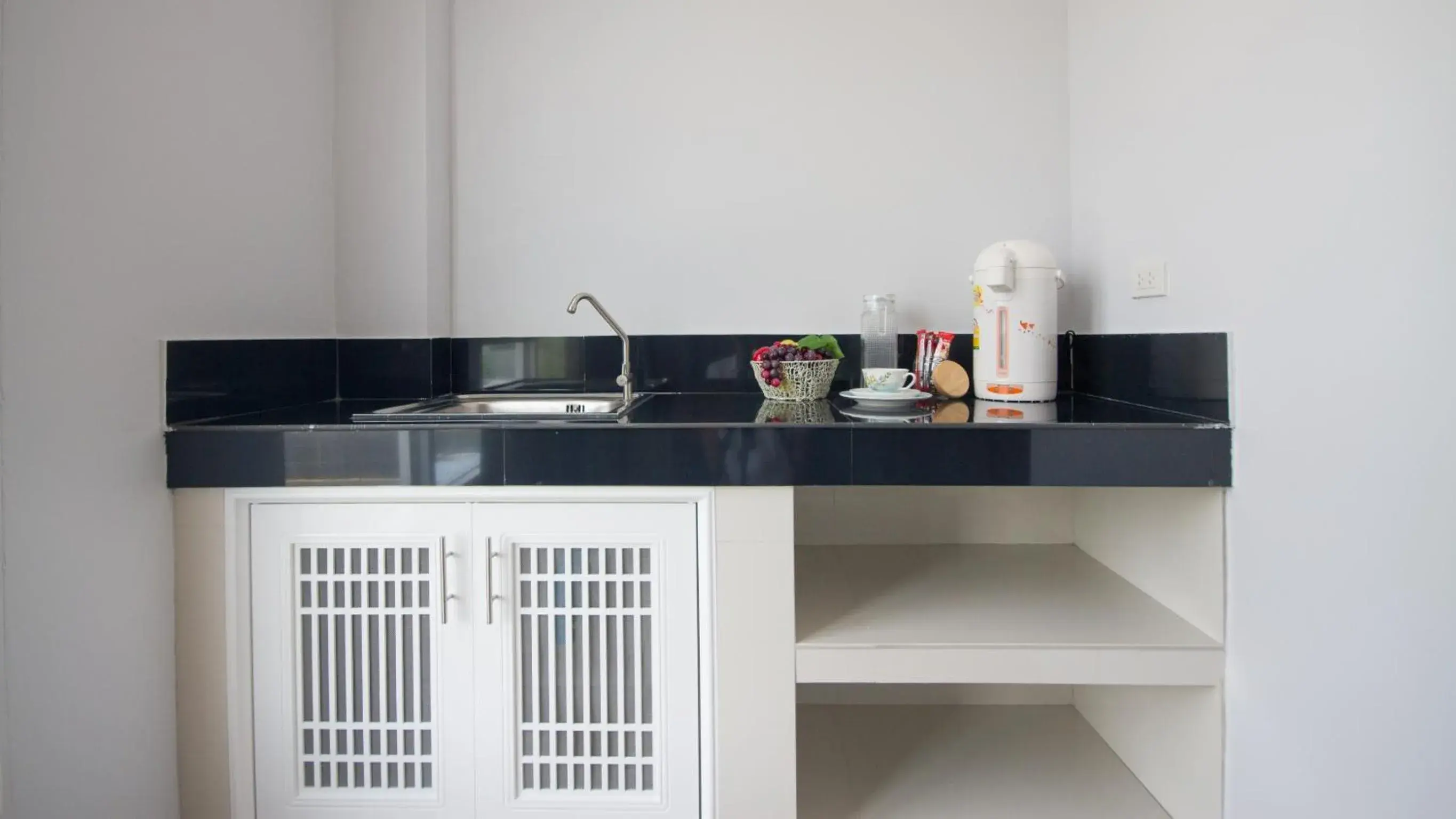 Kitchen/Kitchenette in Charisma Residence