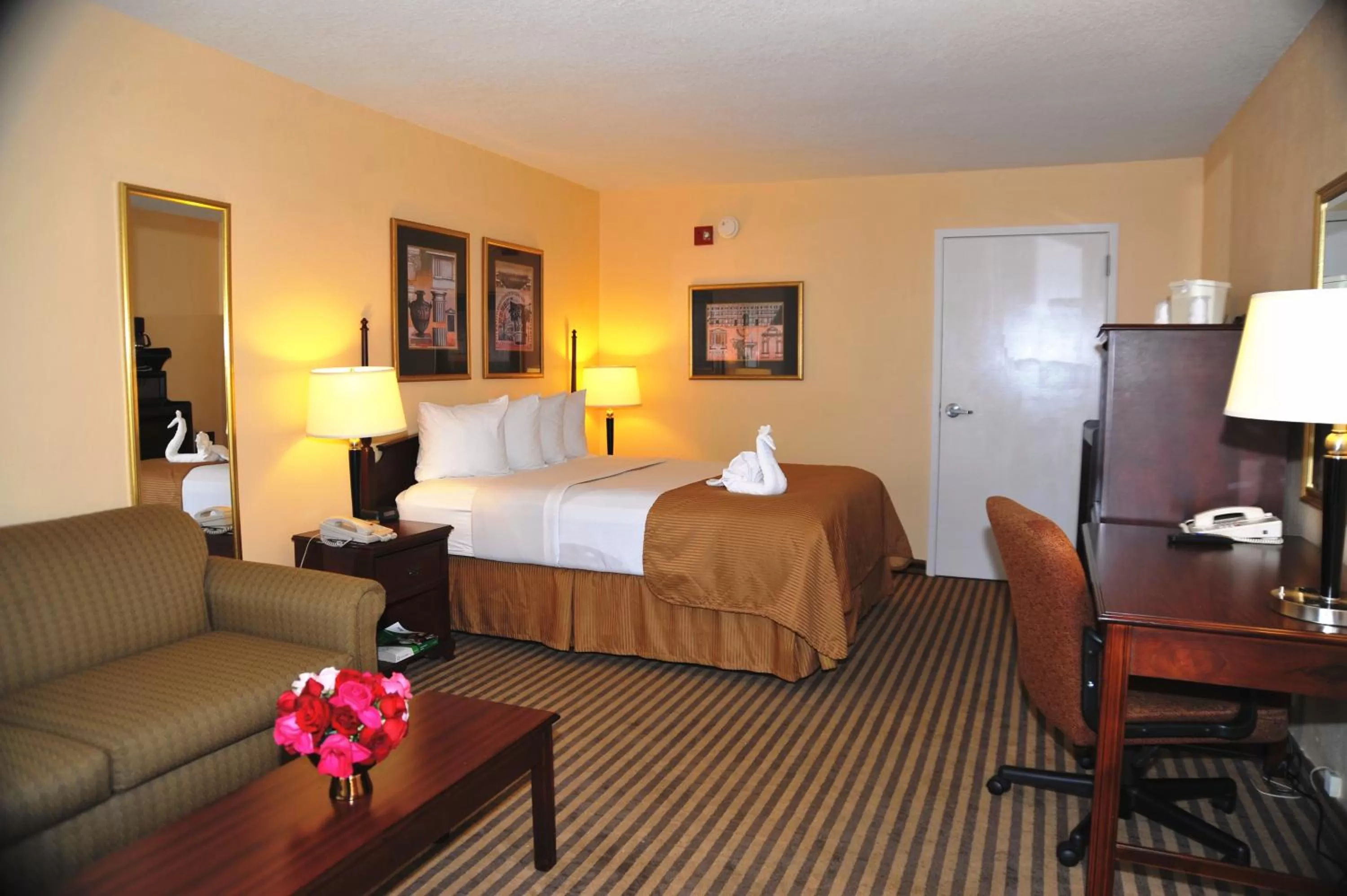 Bed in Opal Hotel & Suites