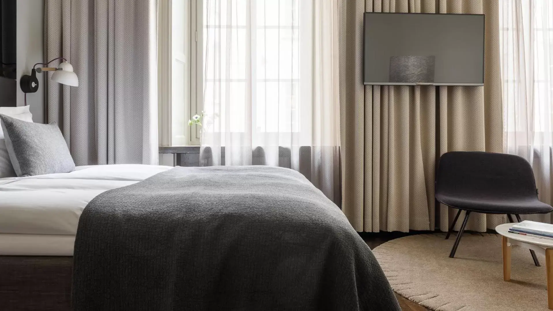 Bed in Nobis Hotel Stockholm, a Member of Design Hotels™
