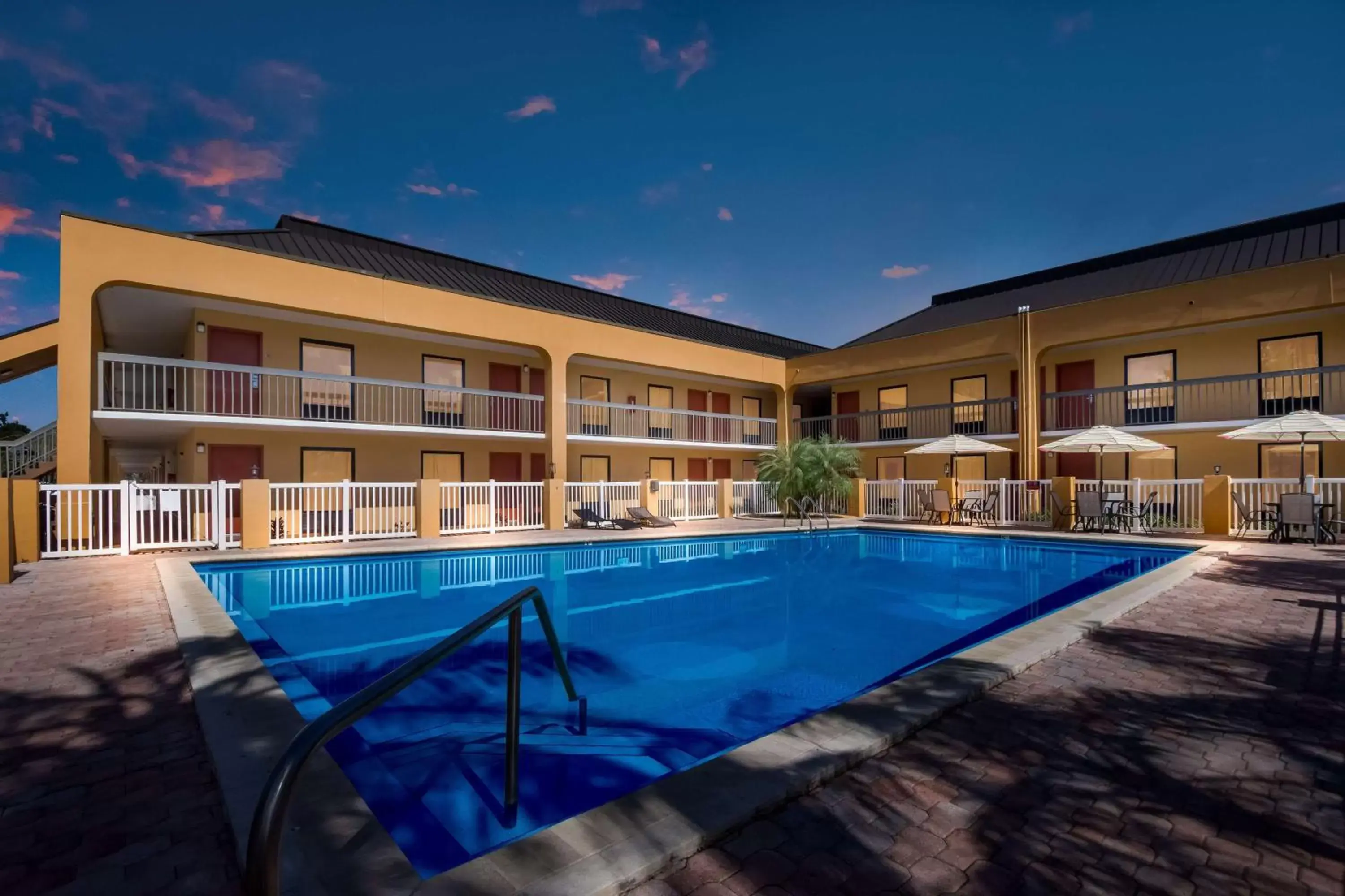 Property building, Swimming Pool in SureStay Hotel by Best Western St Pete Clearwater Airport