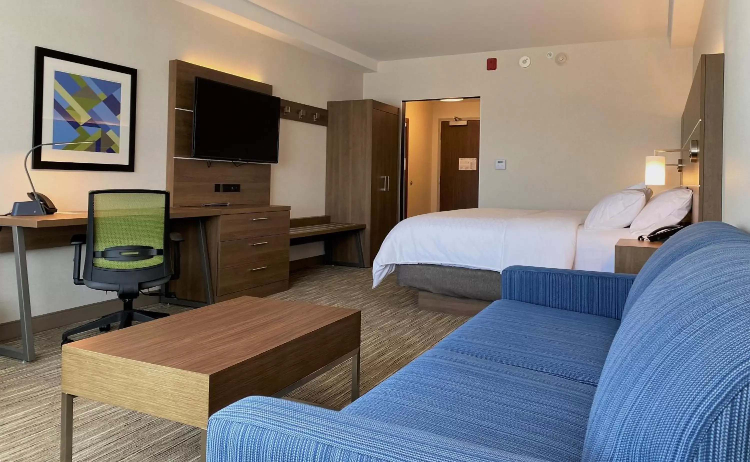 Photo of the whole room, TV/Entertainment Center in Holiday Inn Express & Suites - Aurora, an IHG Hotel