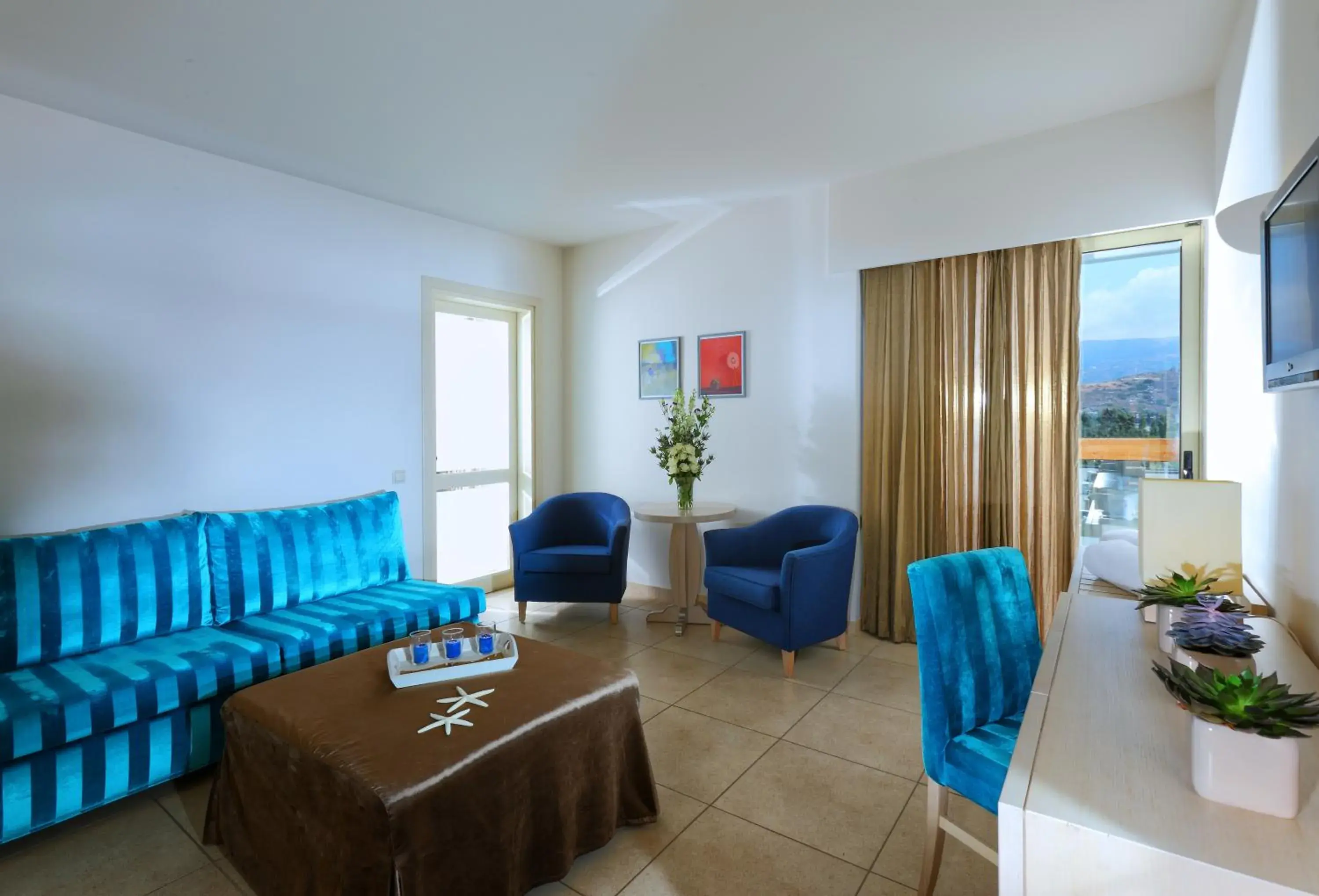 Bedroom, Seating Area in Sitia Beach City Resort & Spa