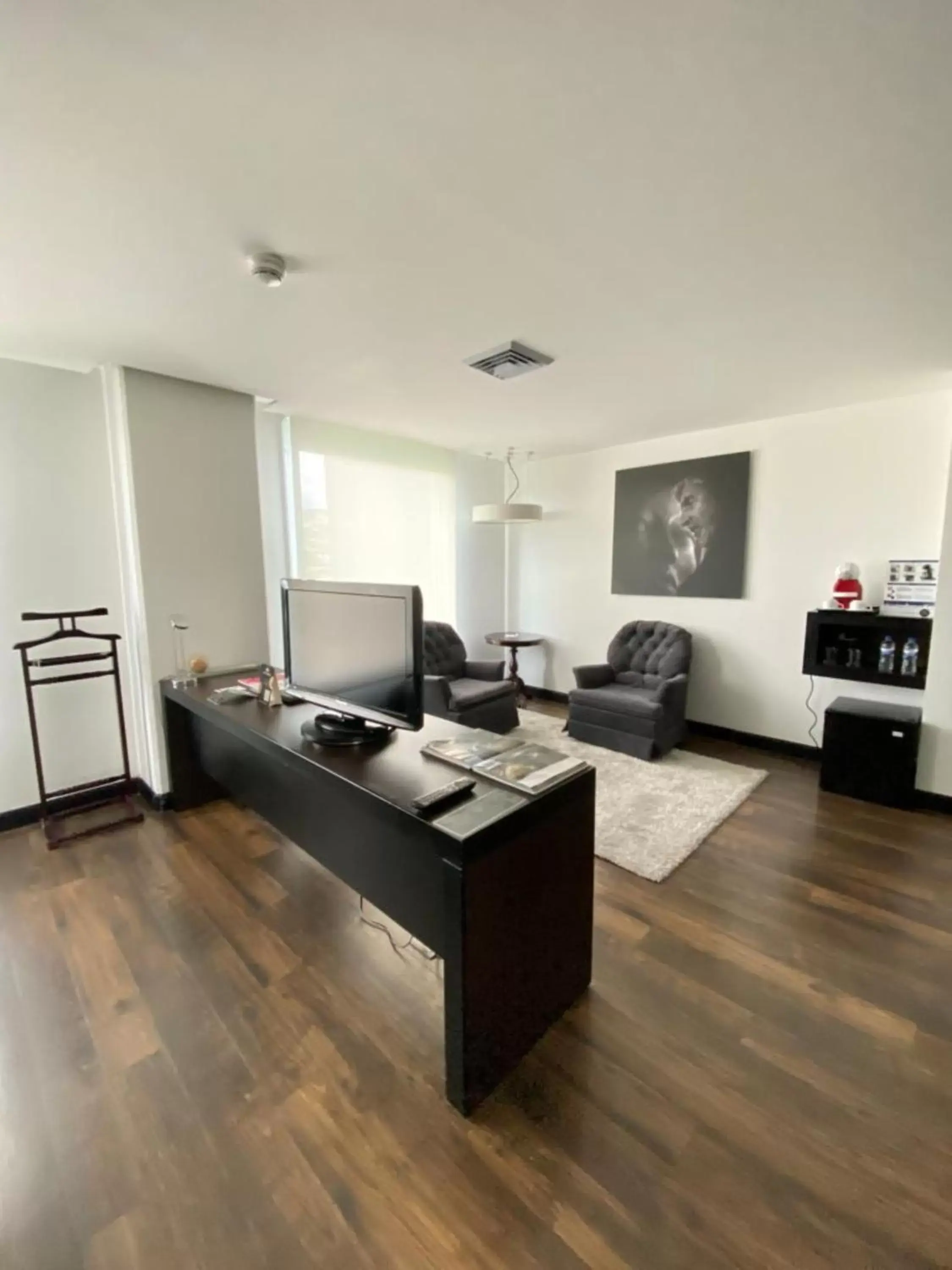 Bedroom, Seating Area in Studio Hotel Boutique