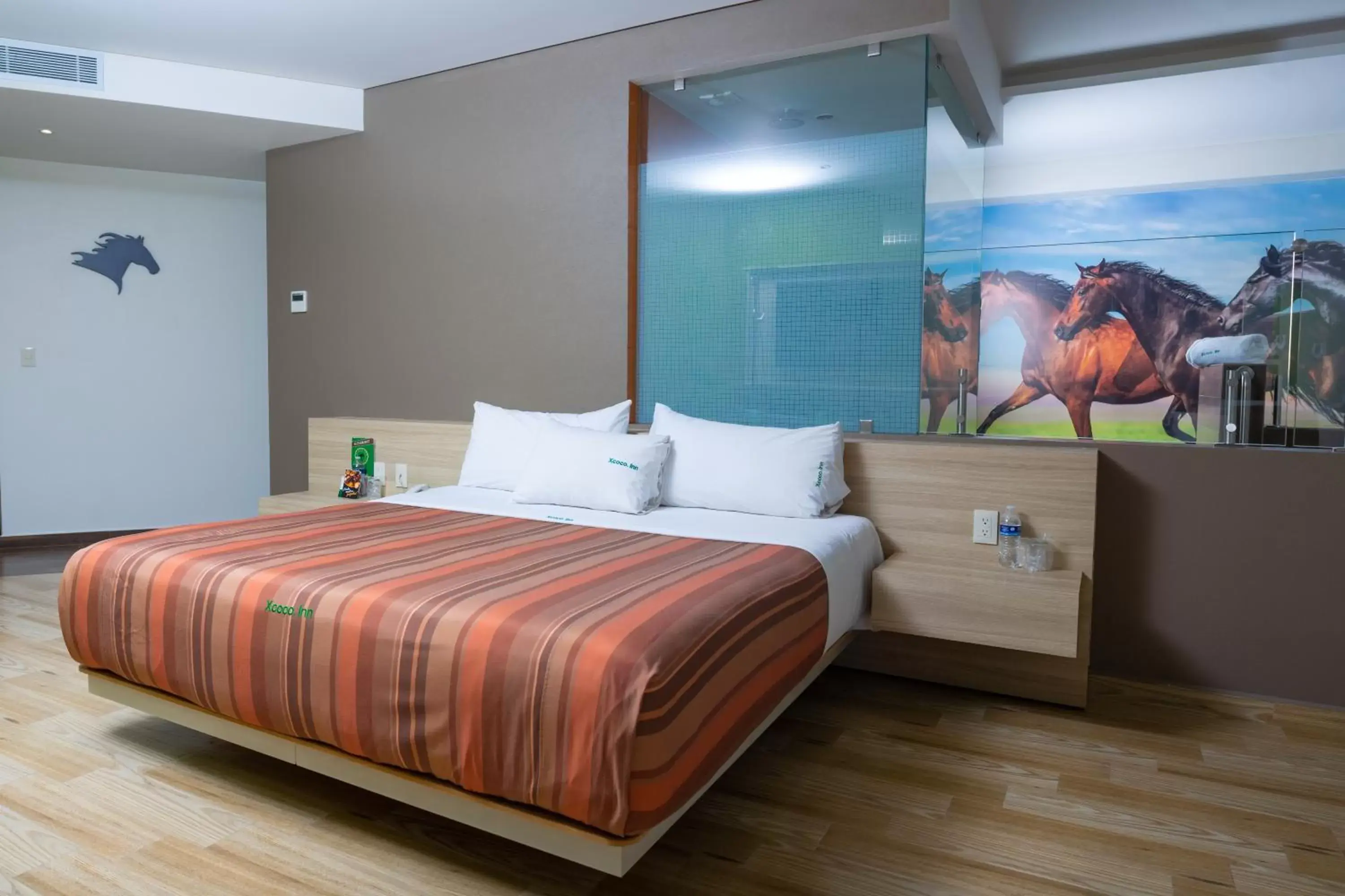 Bed in Hotel Xcoco Inn
