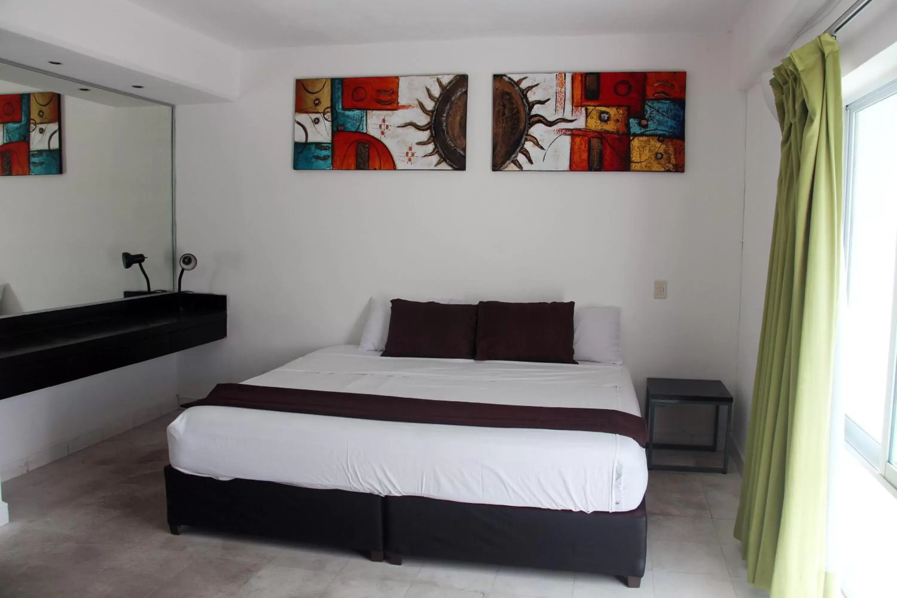 Photo of the whole room, Bed in Hotel & Hostal Casa de Luz Cancun