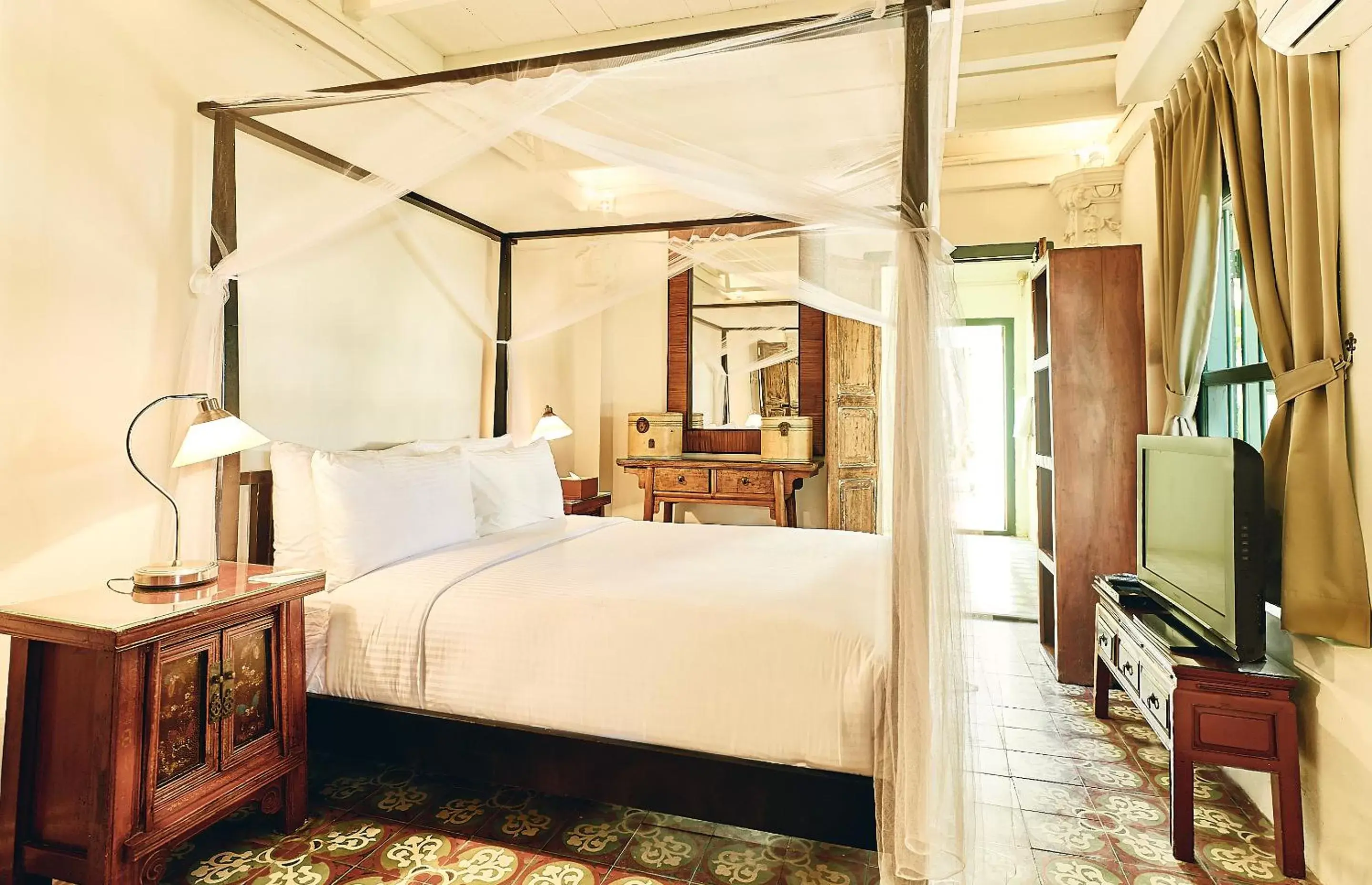 Bed in Temple Tree Resort
