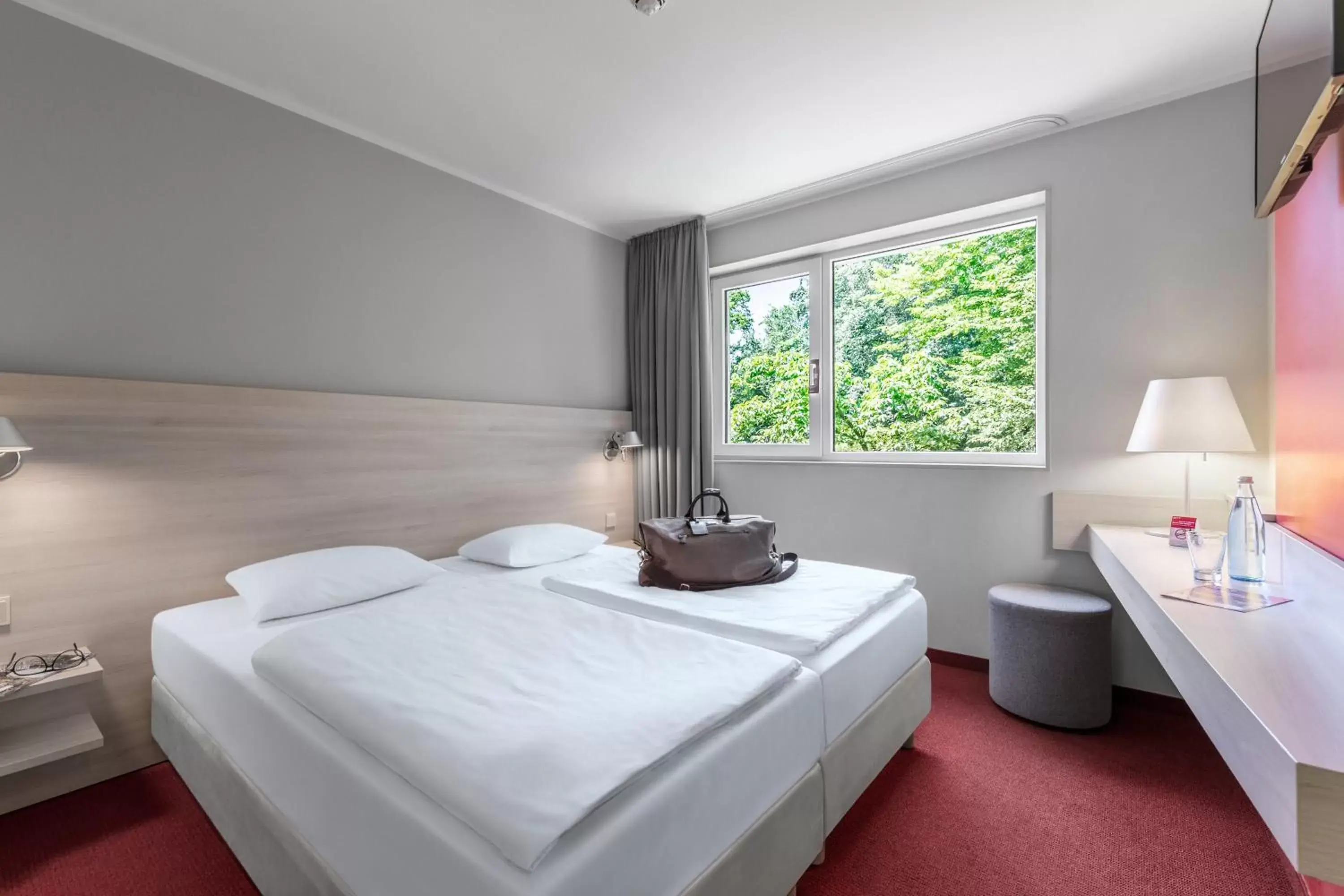 Photo of the whole room, Bed in Serways Hotel Bruchsal West
