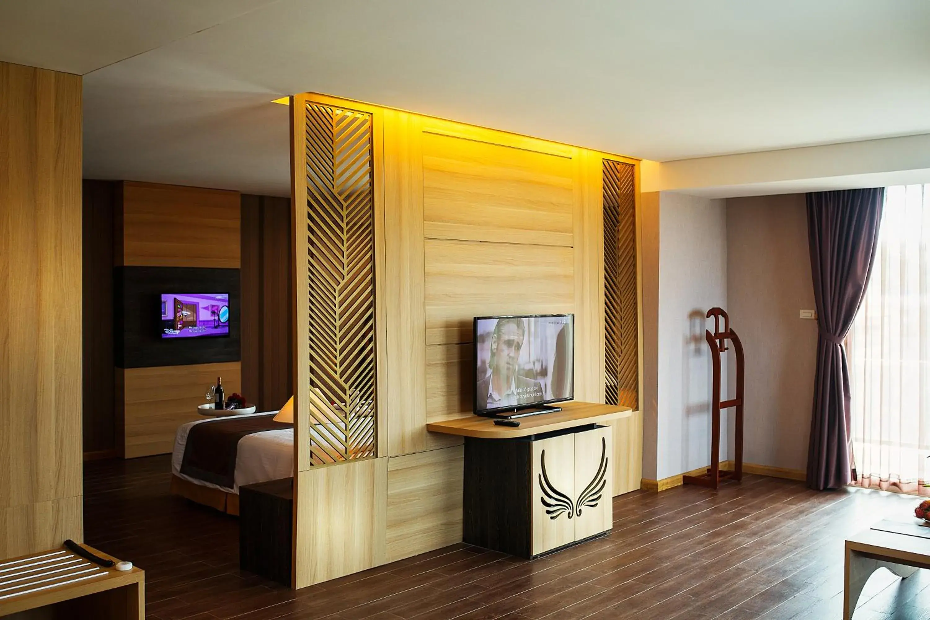 Photo of the whole room, TV/Entertainment Center in Muong Thanh Holiday Mui Ne Hotel