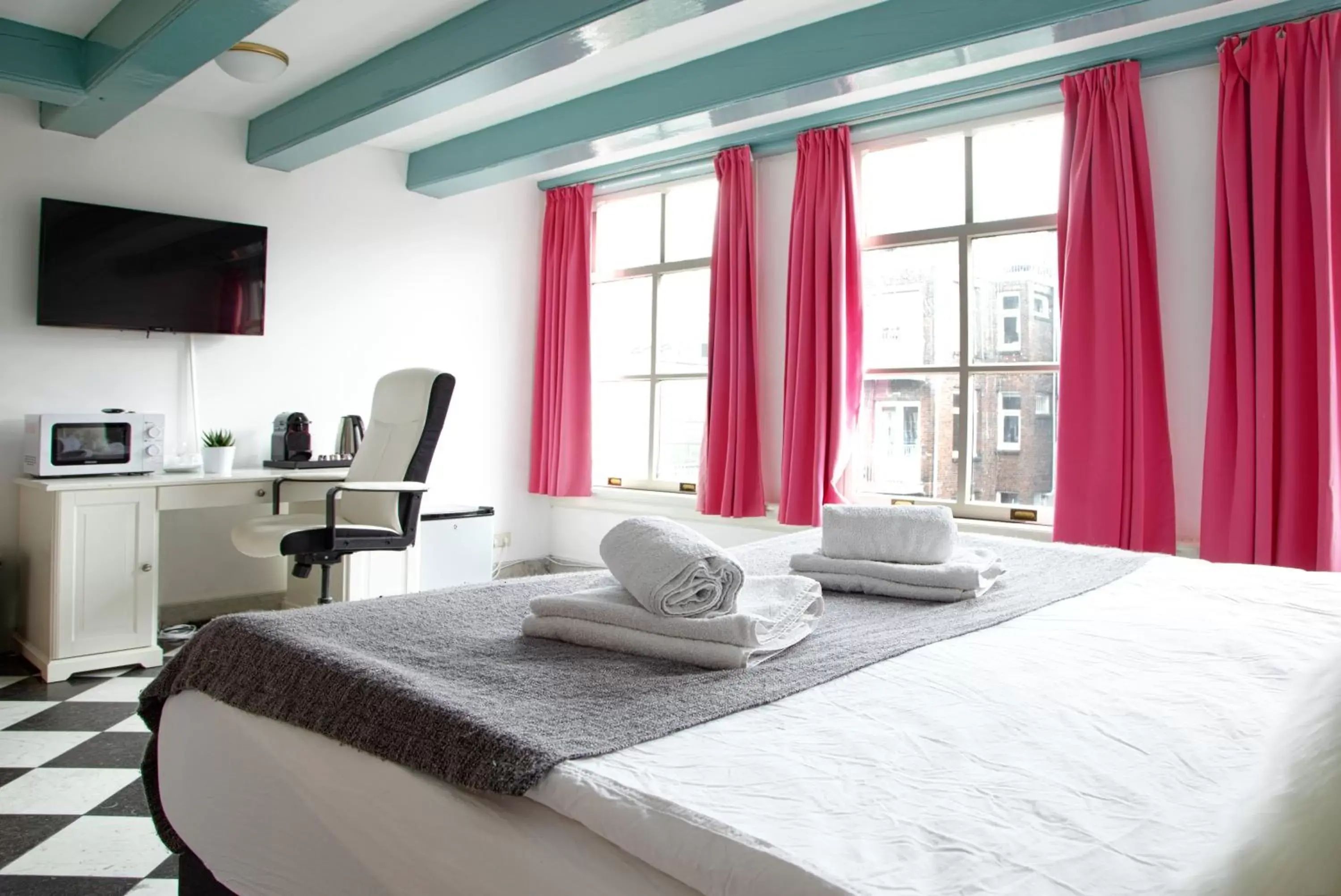 Bed in Modern Canal House Loft - City Center
