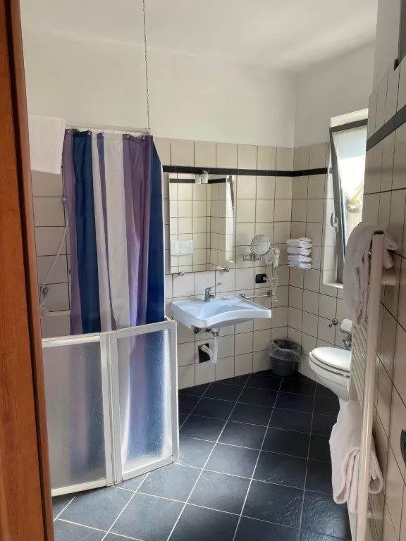 Bathroom in AgriCamping AlbaVillage Hotel & Wellness