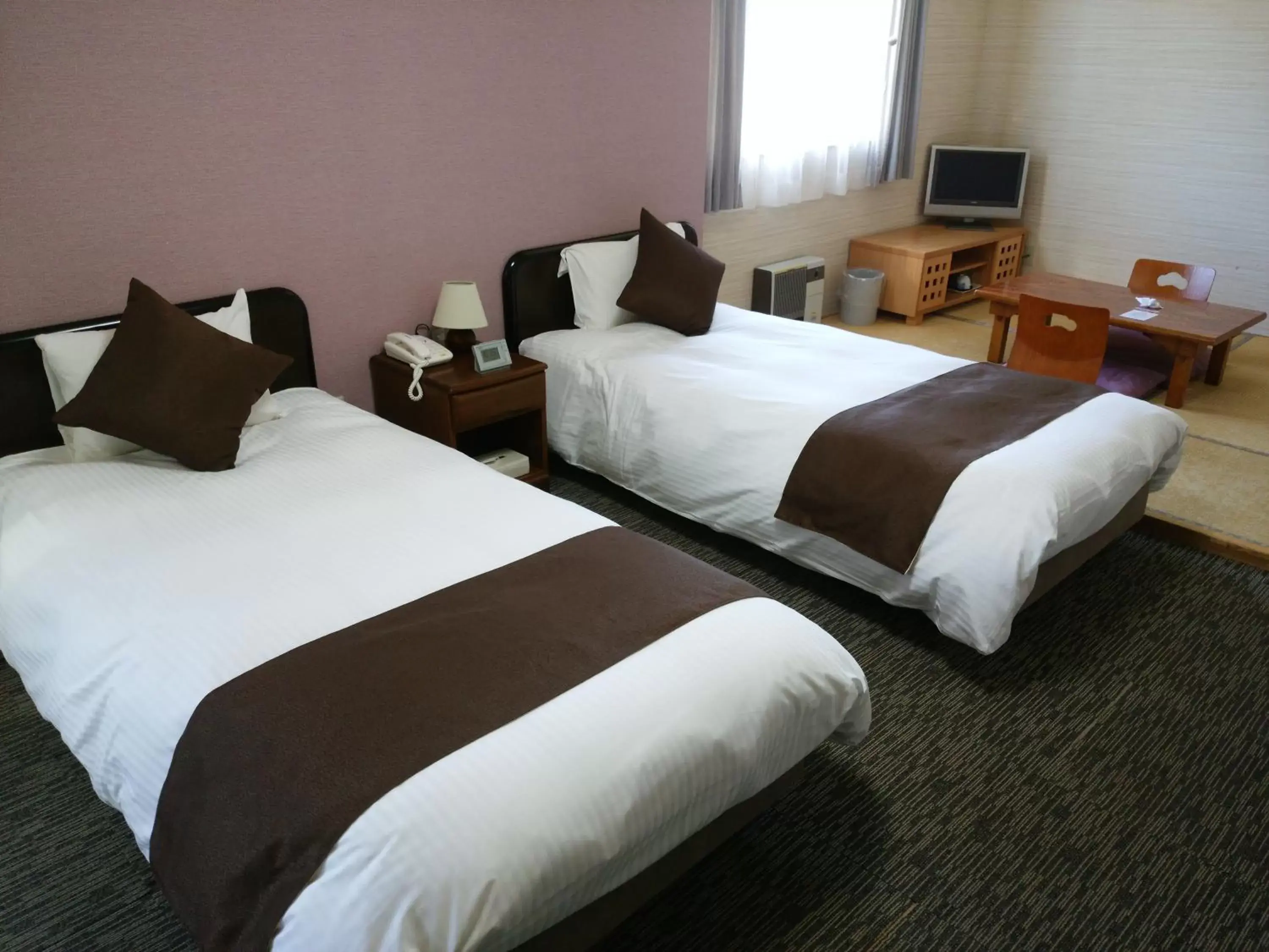 Photo of the whole room, Bed in Resort Inn North Country