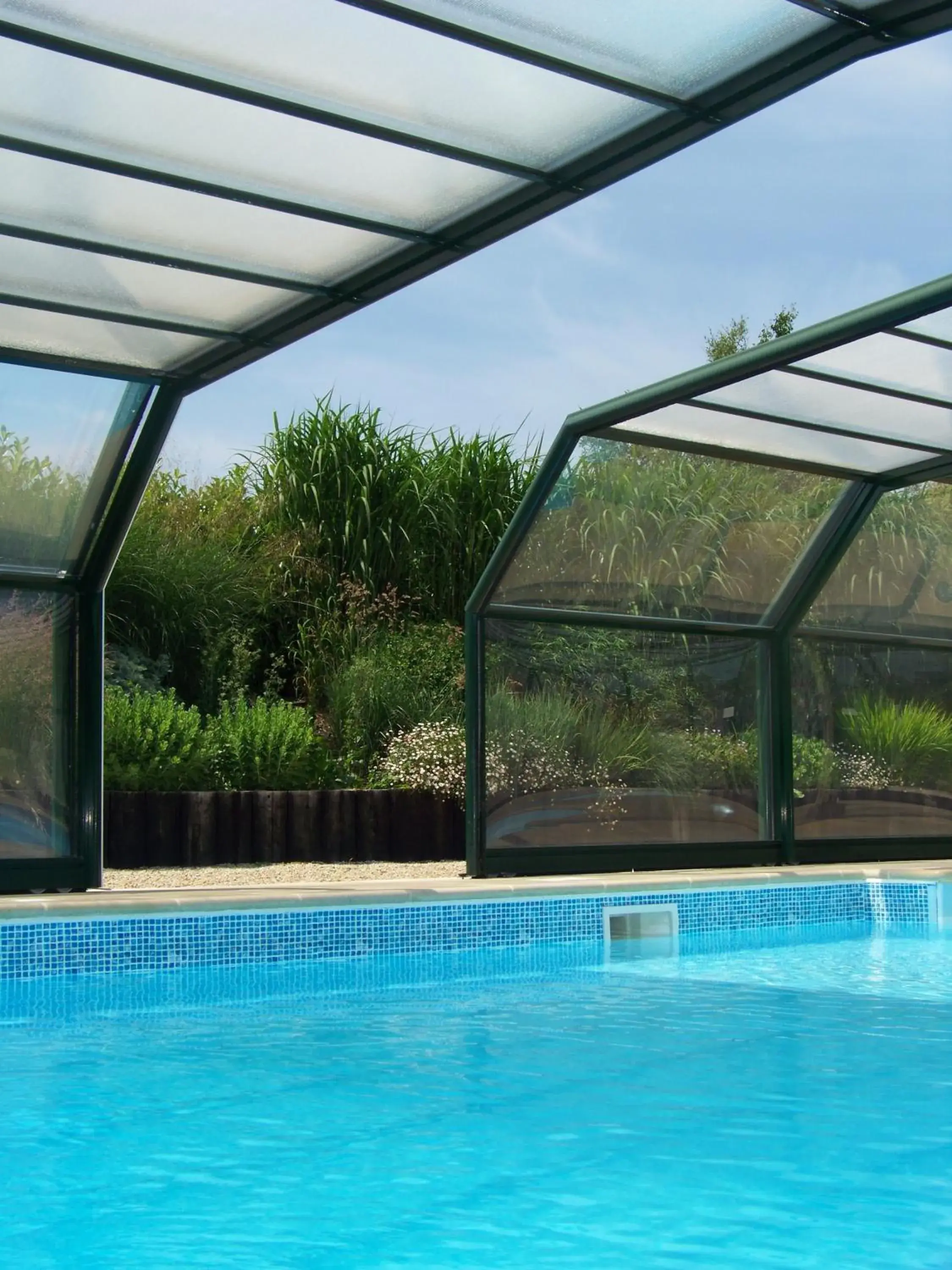 Swimming Pool in Hotel Nuit Et Jour - La Maison de Lucile