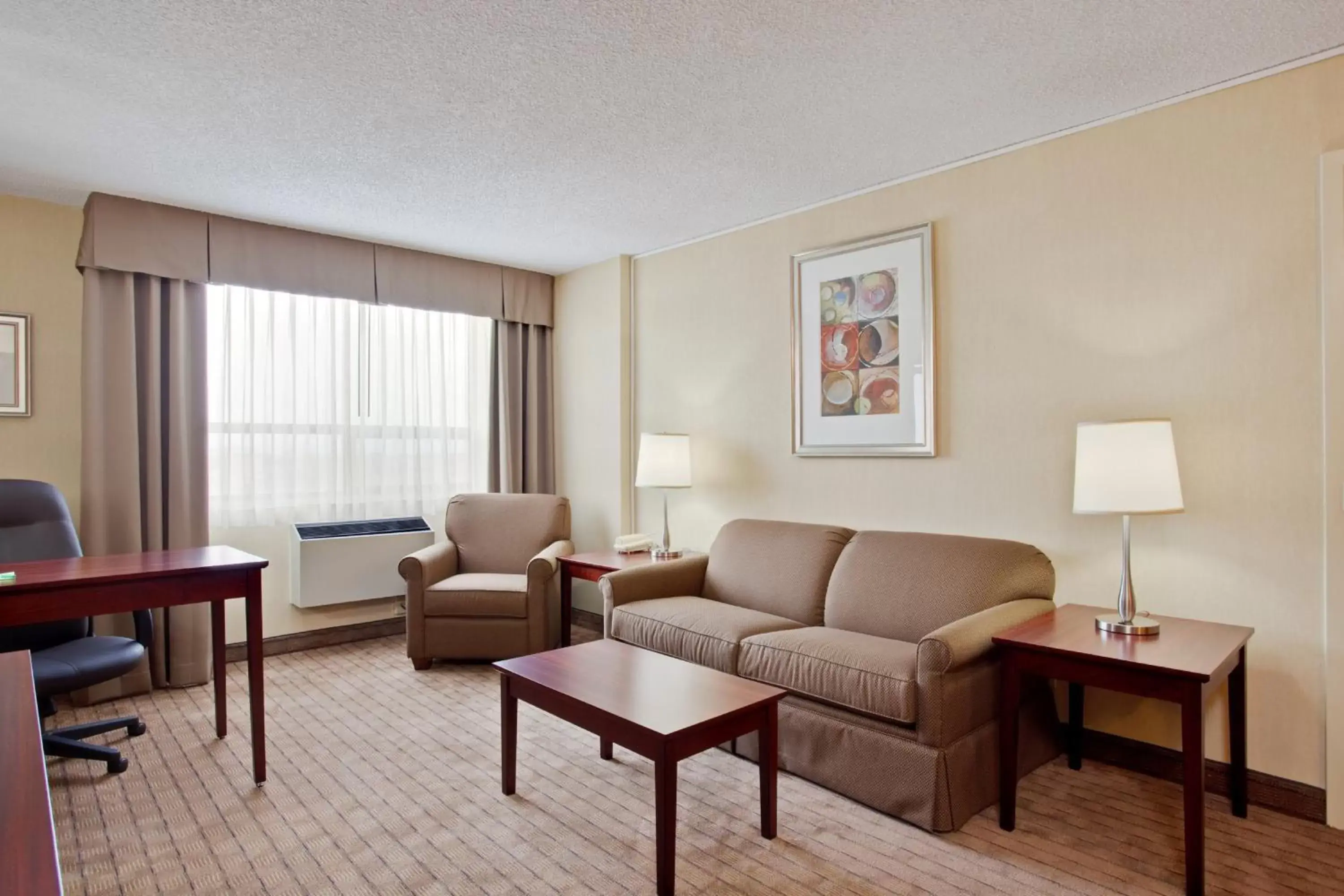 Photo of the whole room, Seating Area in Holiday Inn & Suites Winnipeg Downtown, an IHG Hotel