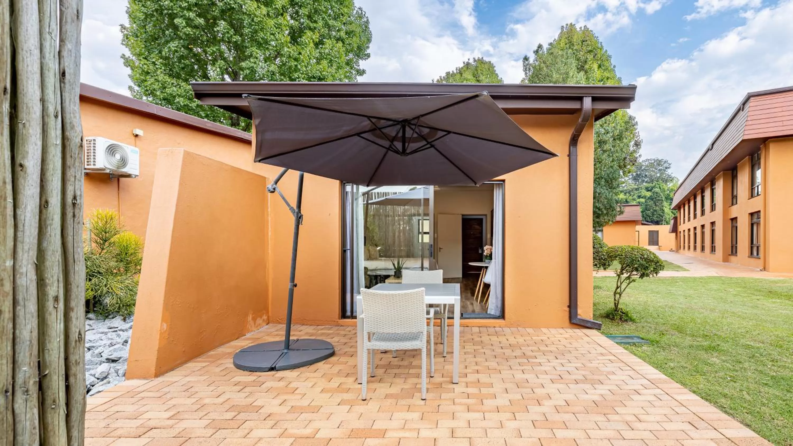 Patio in African Sky Hotels - Pine Lake Inn