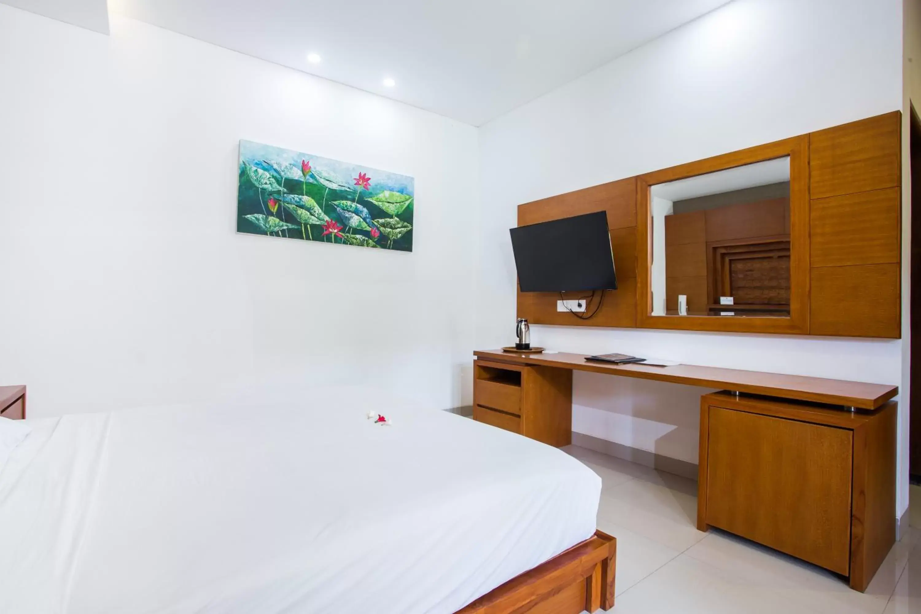 Bedroom, Kitchen/Kitchenette in Sinar Bali Hotel