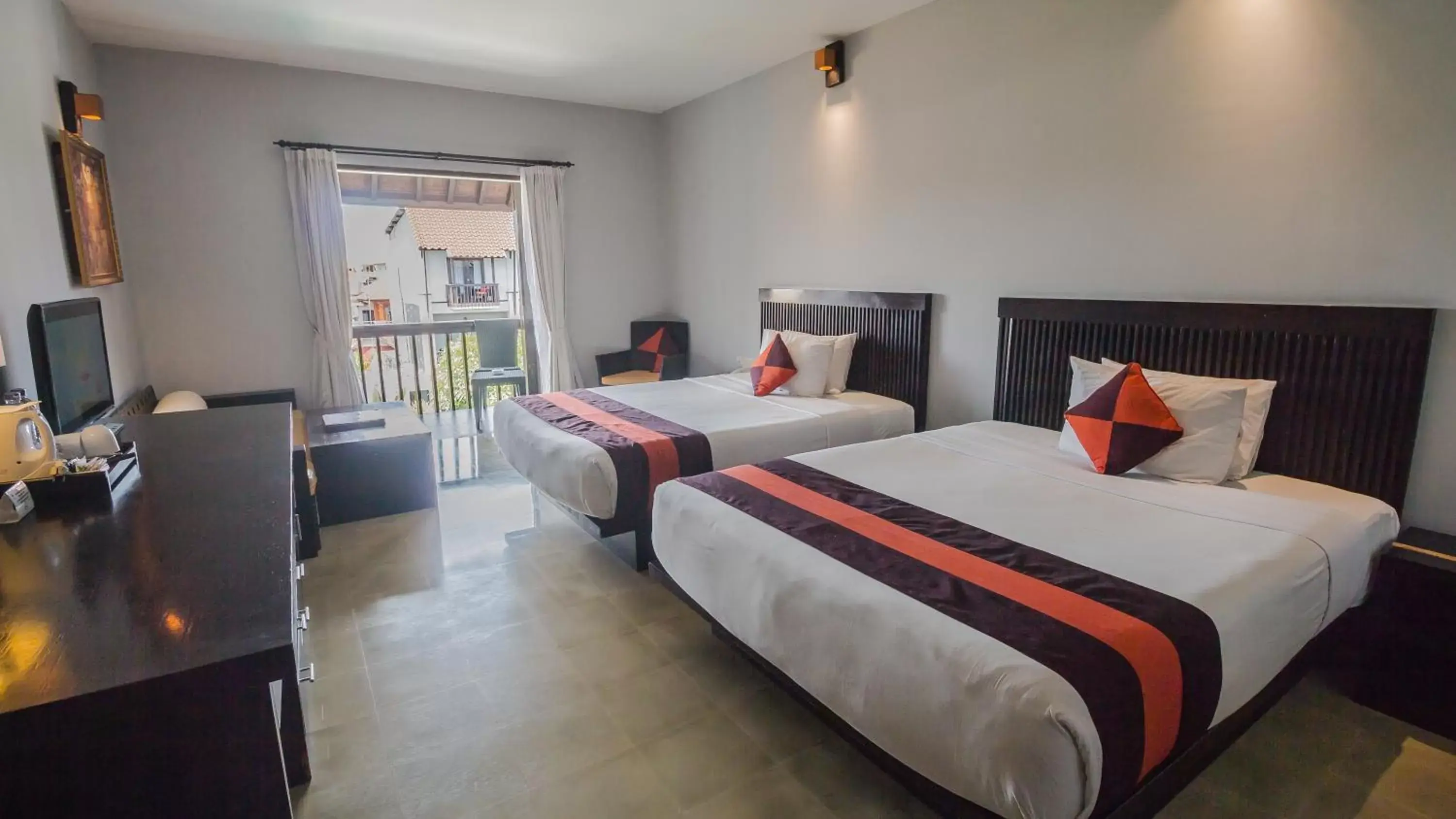 Bed in The Lokha Legian Resort & Spa