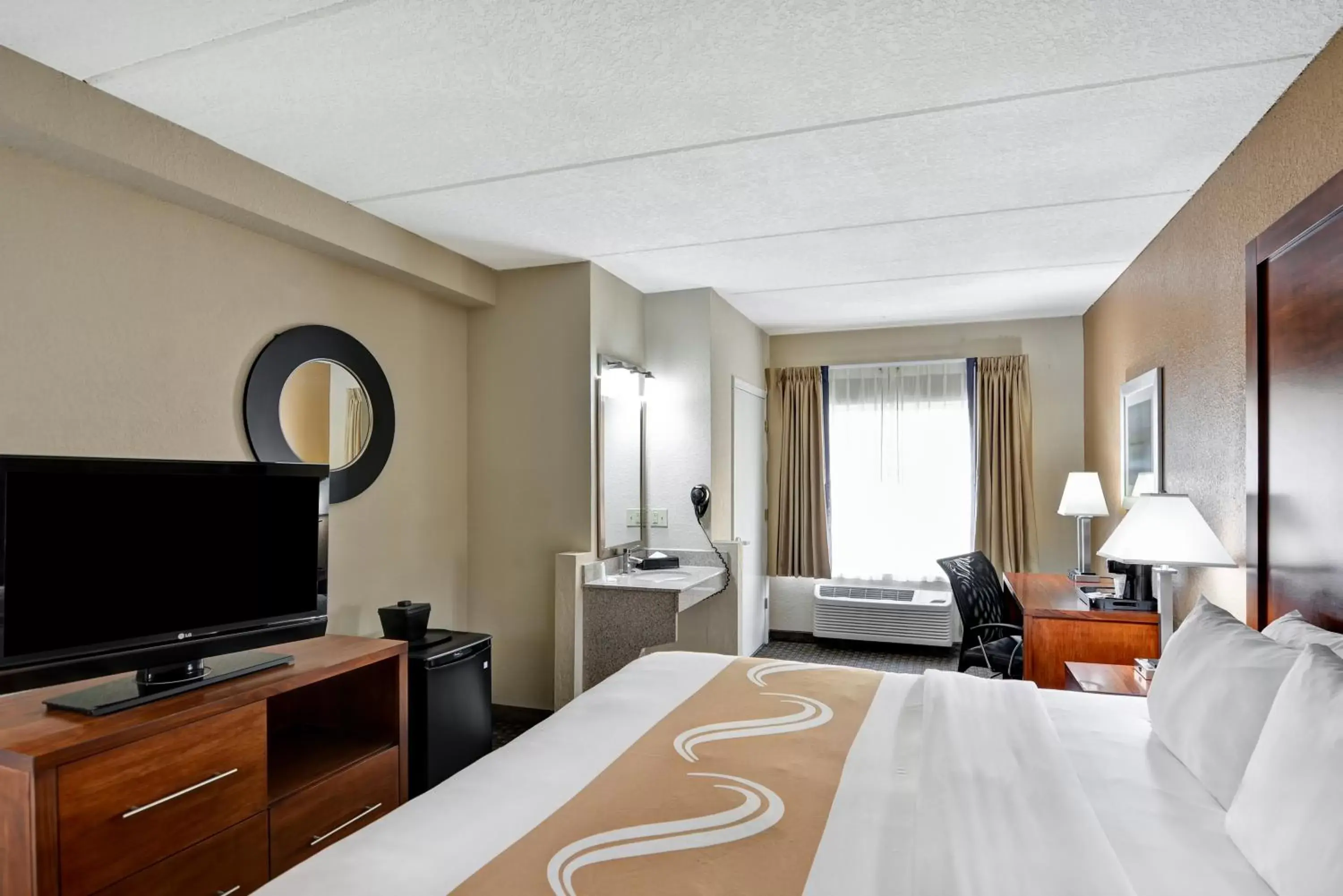 Photo of the whole room, TV/Entertainment Center in Quality Inn & Suites Heritage Park