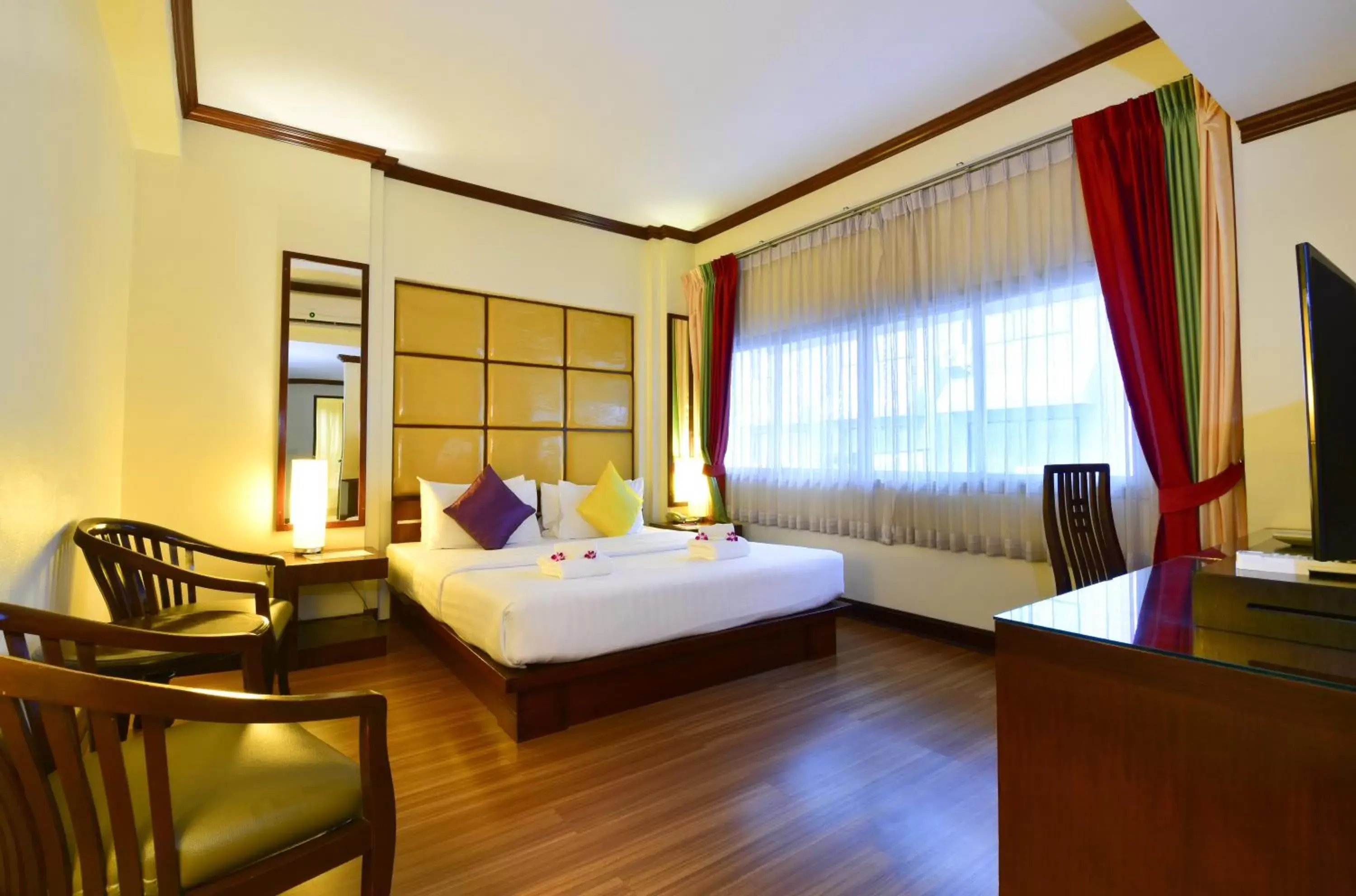 Bedroom in Grand Business Inn