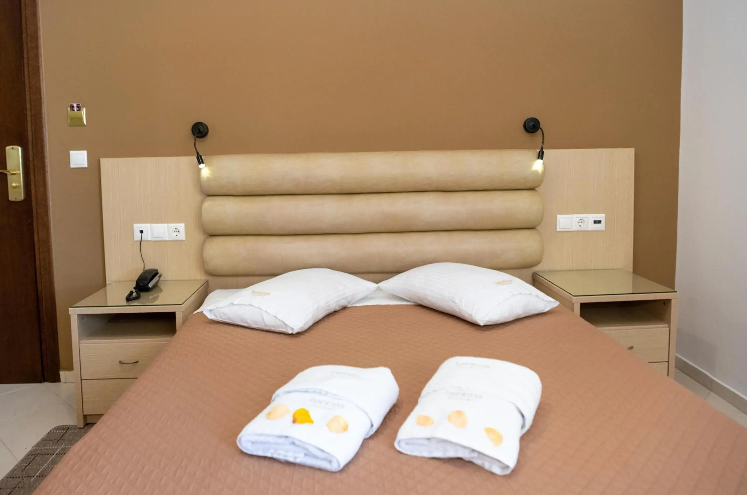 Bed in Kronos Hotel