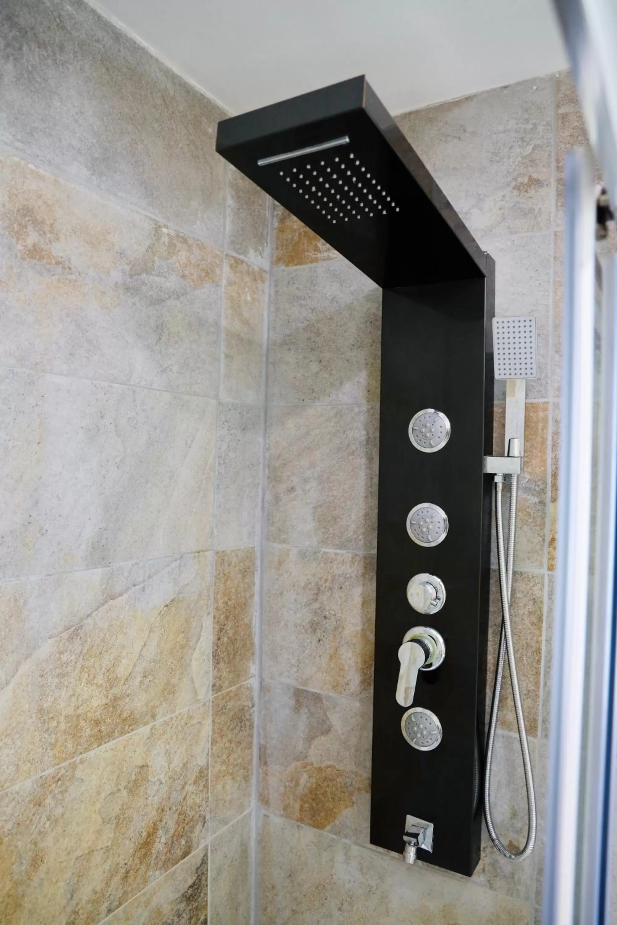 Shower in The Mike Hotel by CX Collection