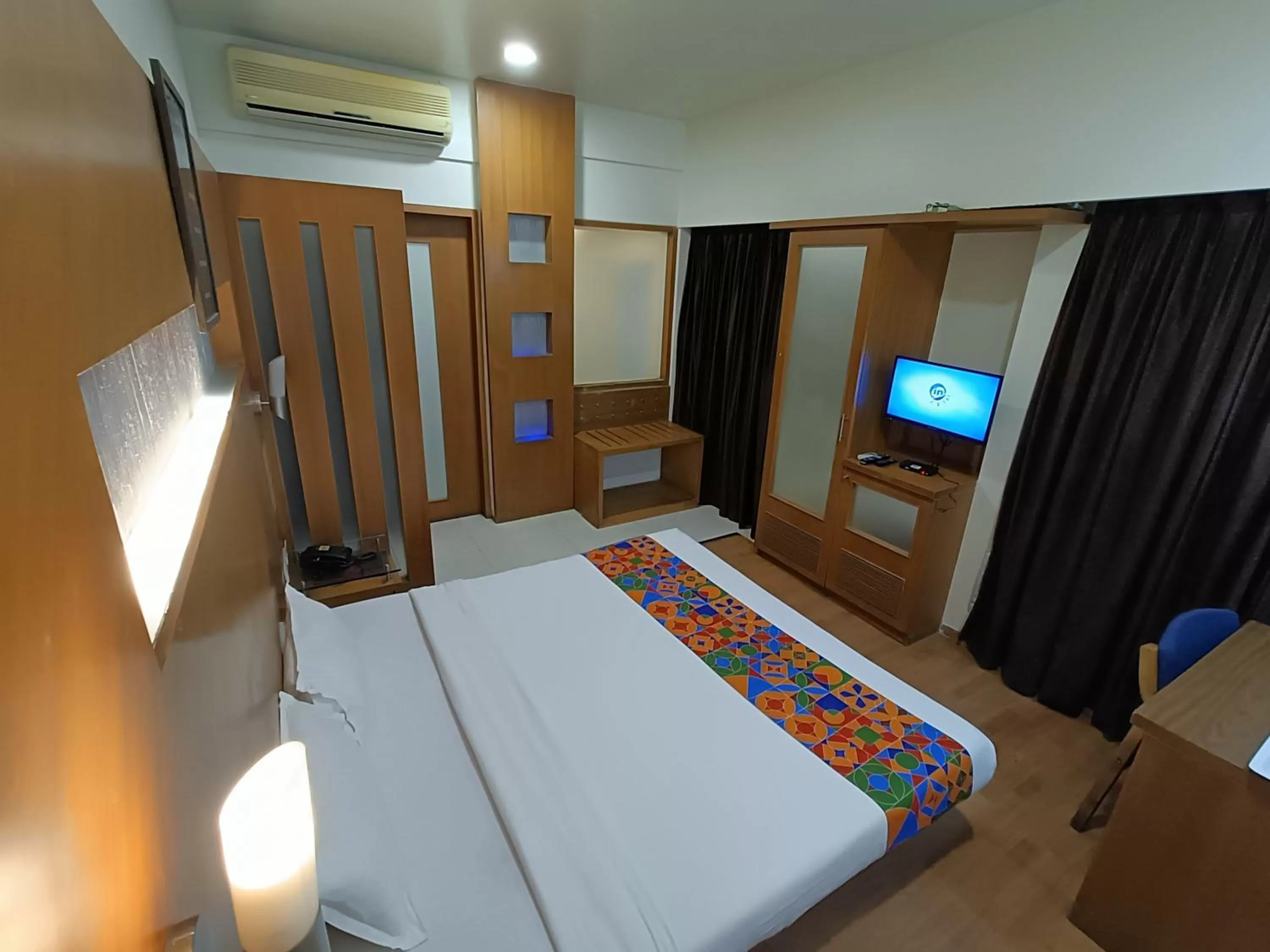 Bed in Rapid Lakme Executive Hotel