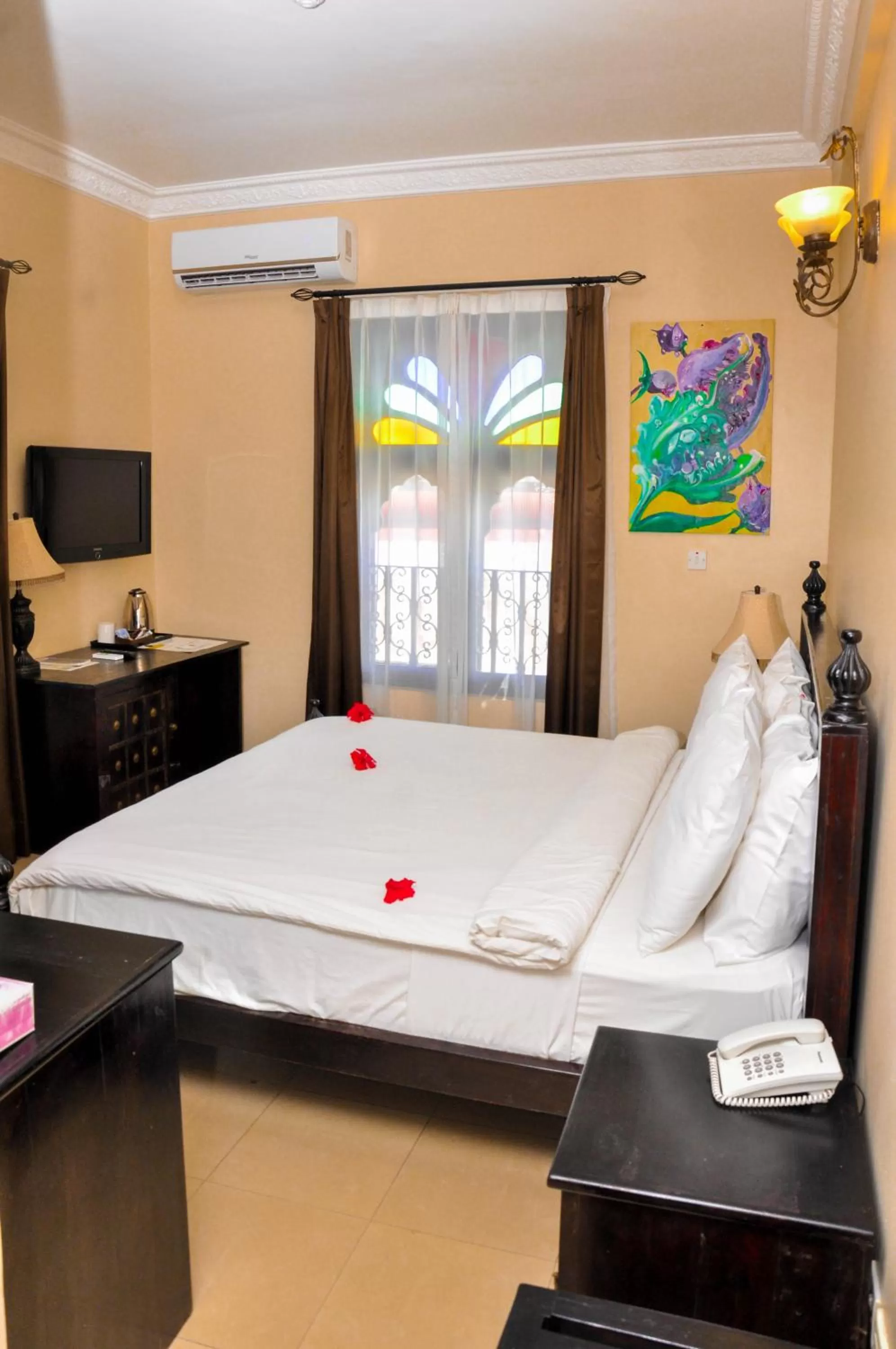 Bedroom, Bed in Golden Tulip Stone Town Boutique