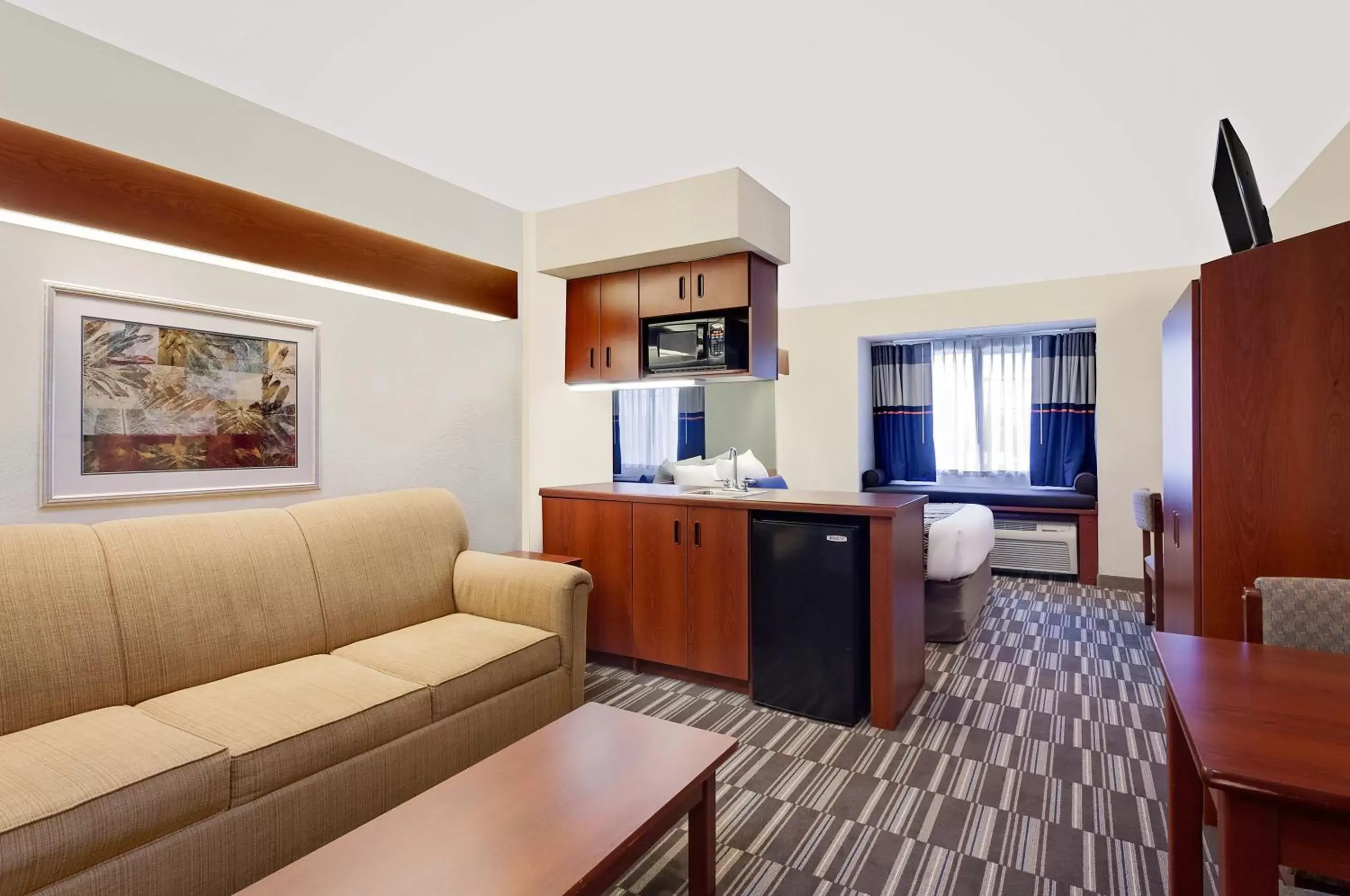 Living room, Seating Area in Microtel Inn & Suites By Wyndham Middletown
