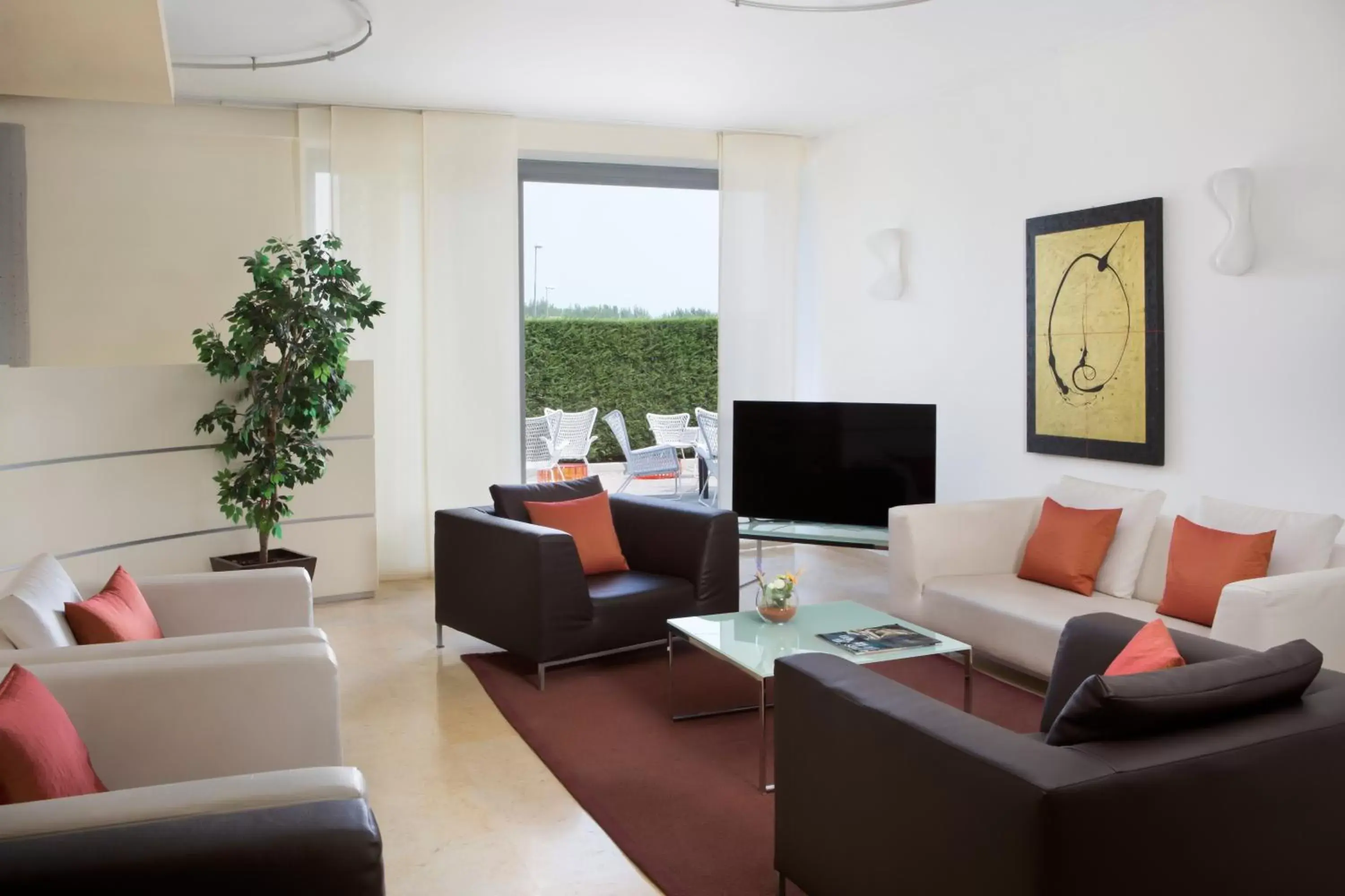 Communal lounge/ TV room, Seating Area in Hotel Montemezzi