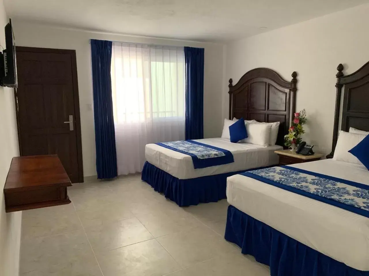 Bed in Hotel Catedral Valladolid Yucatan
