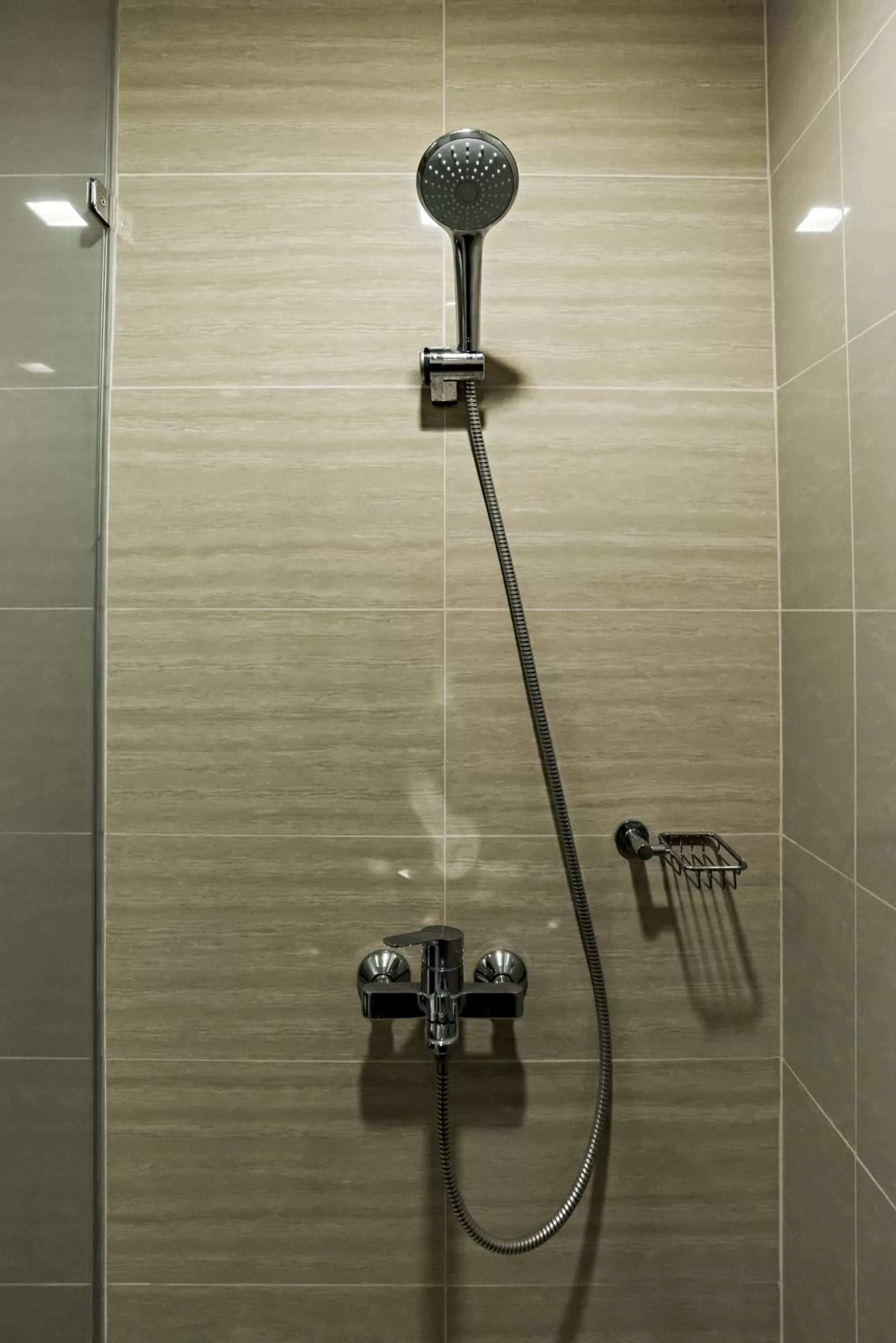 Shower in 1BR Suite in Uptown BGC
