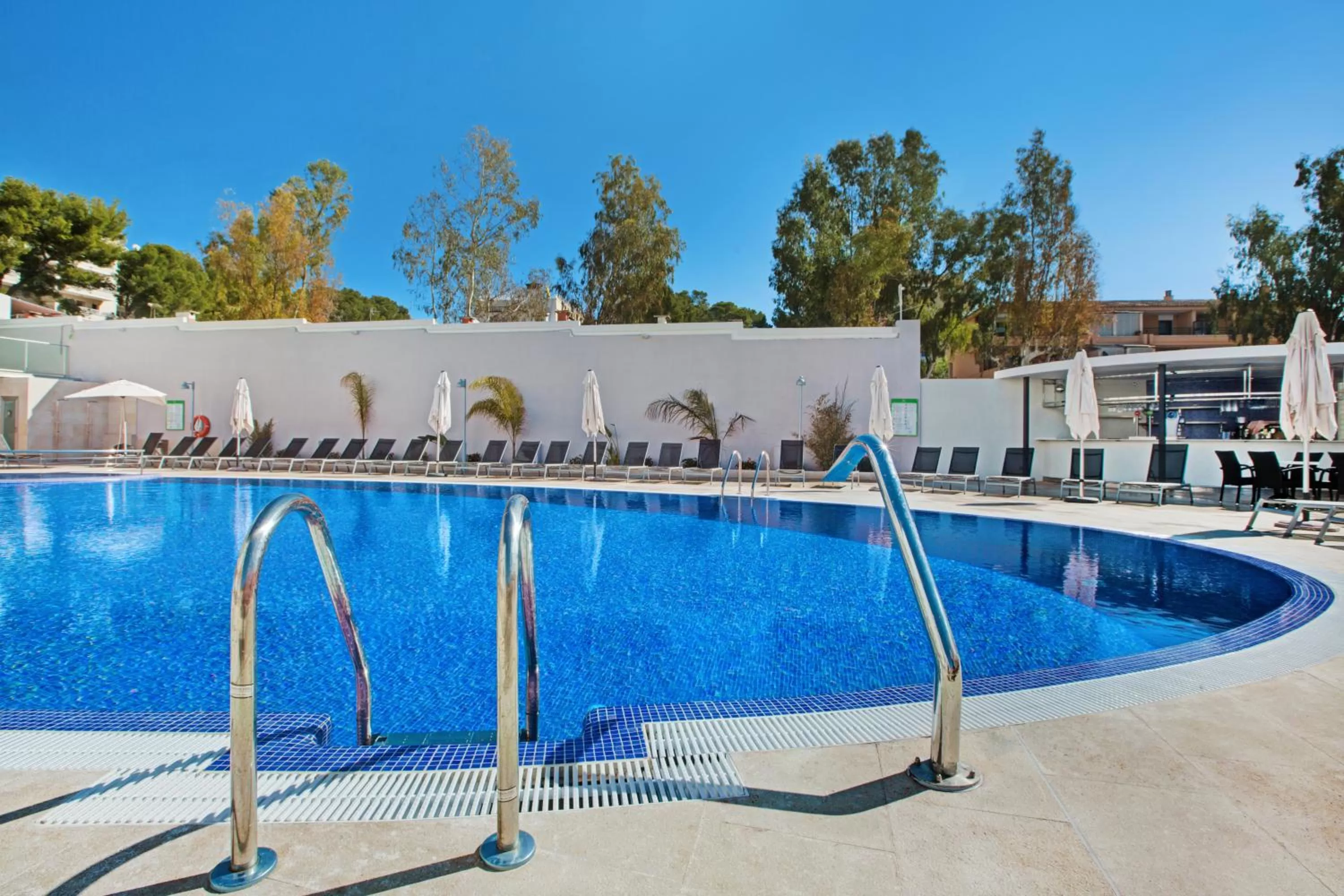 Swimming pool in Aparthotel y Hotel Paguera Beach
