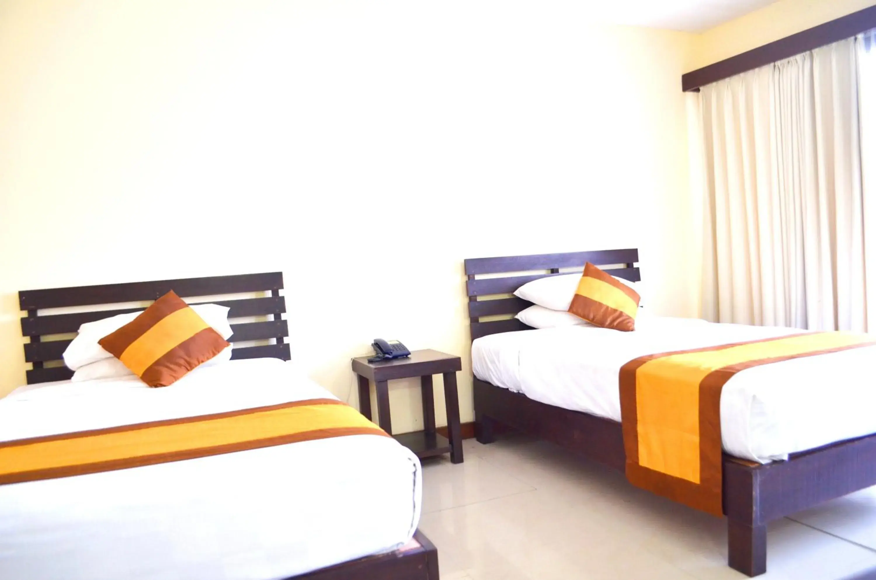 Bed in Nirmala Hotel & Convention Centre Bed in Nirmala Hotel & Convention Centre