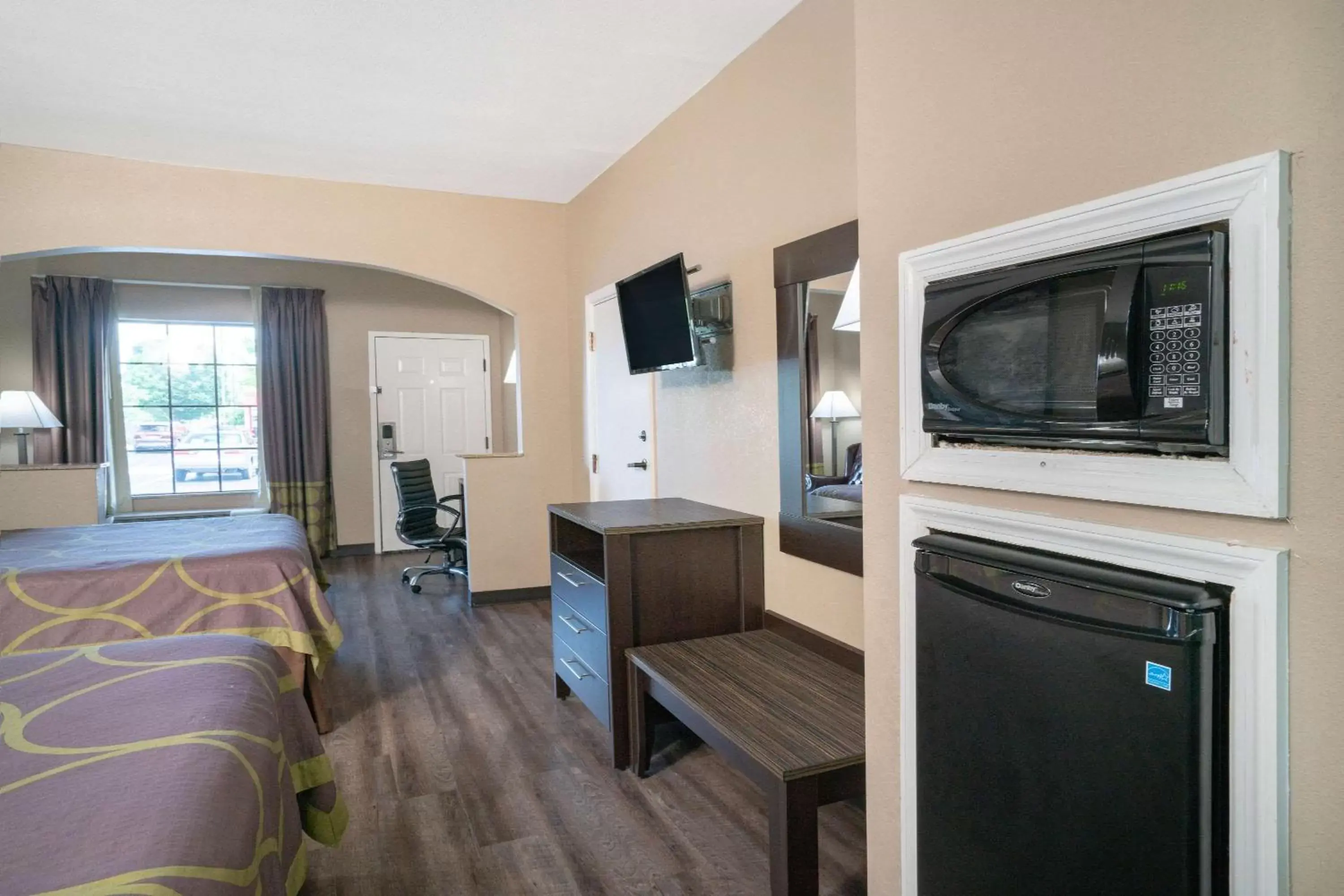 Photo of the whole room, TV/Entertainment Center in Super 8 by Wyndham Murfreesboro