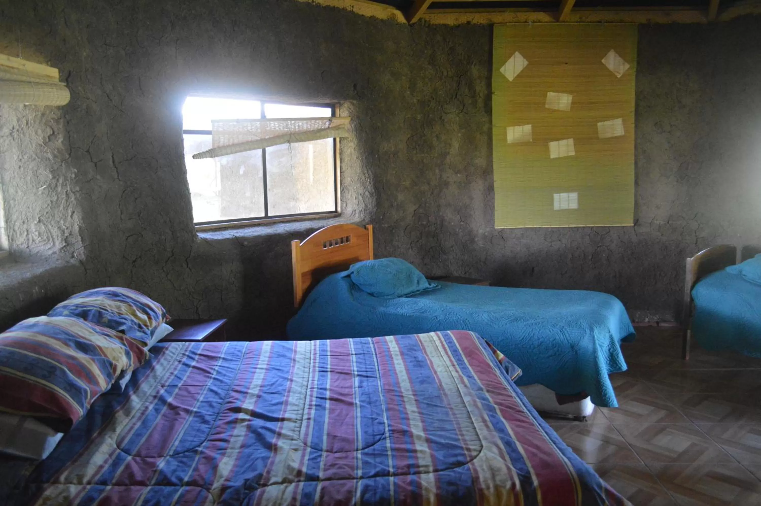 Bed in Coyunche Cabañas y Camping Laja & San Rosendo