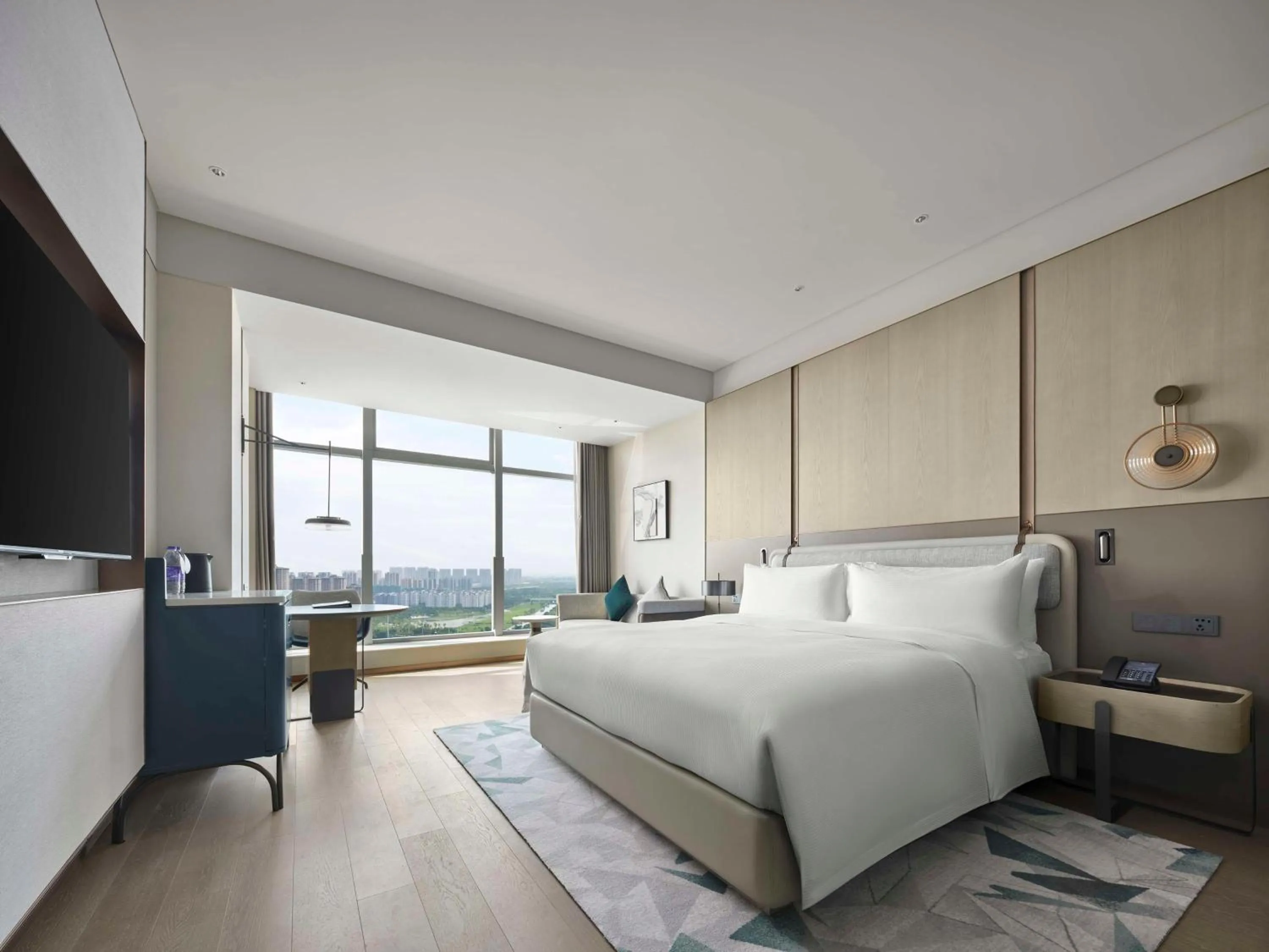 Living room, Bed in Doubletree By Hilton Rugao