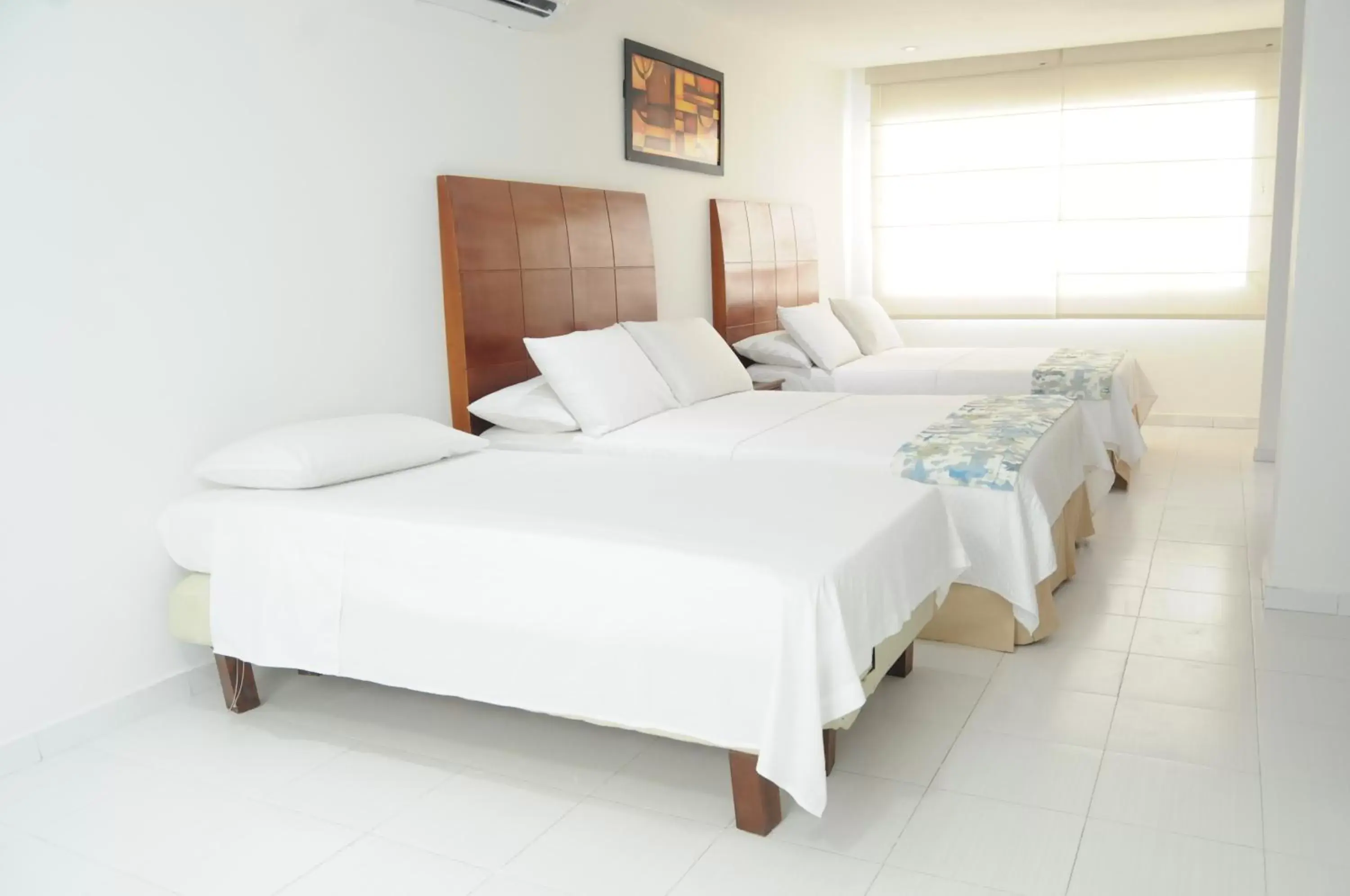 Guests, Bed in Coral Reef Hotel