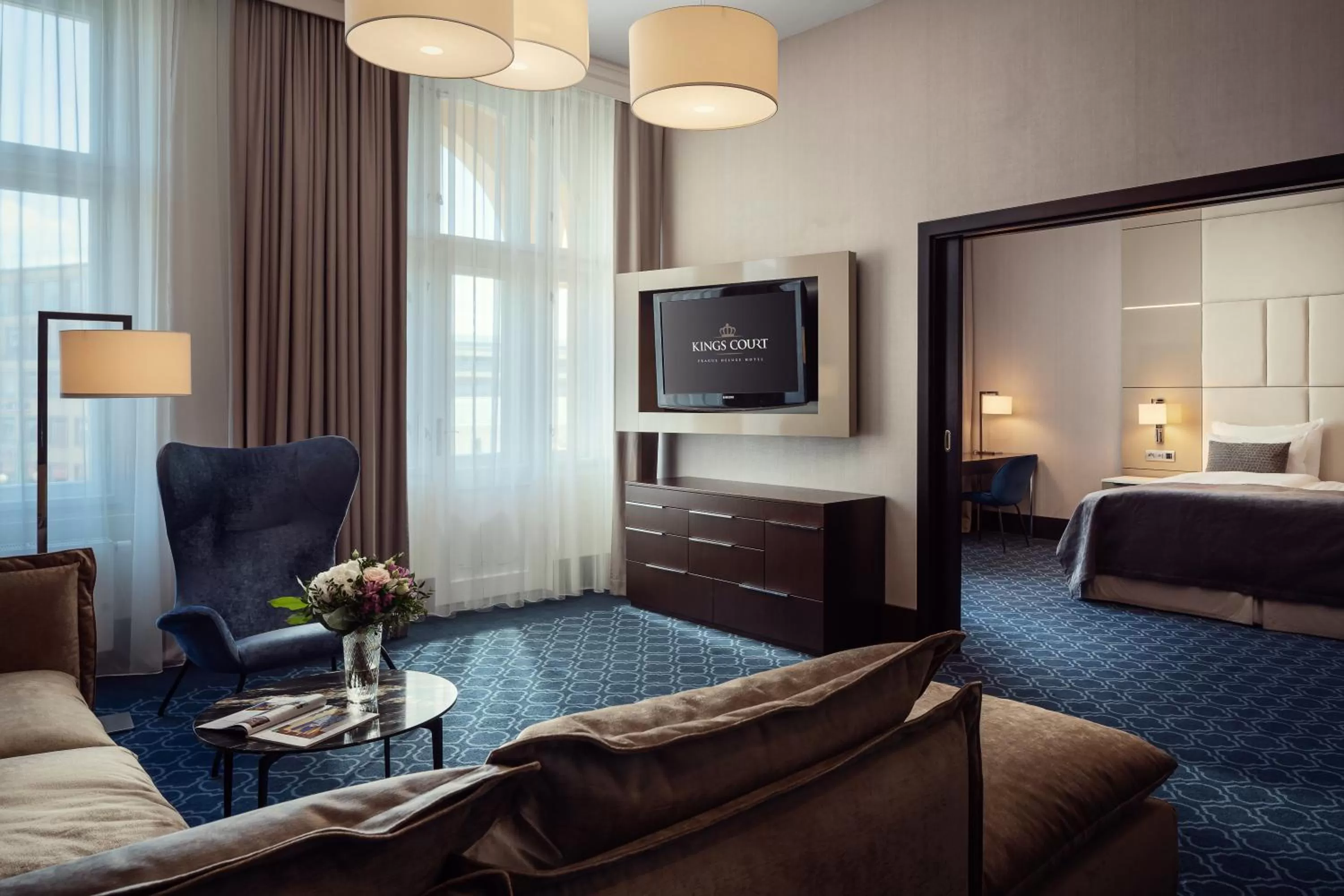 Seating area, Bed in Hotel KINGS COURT