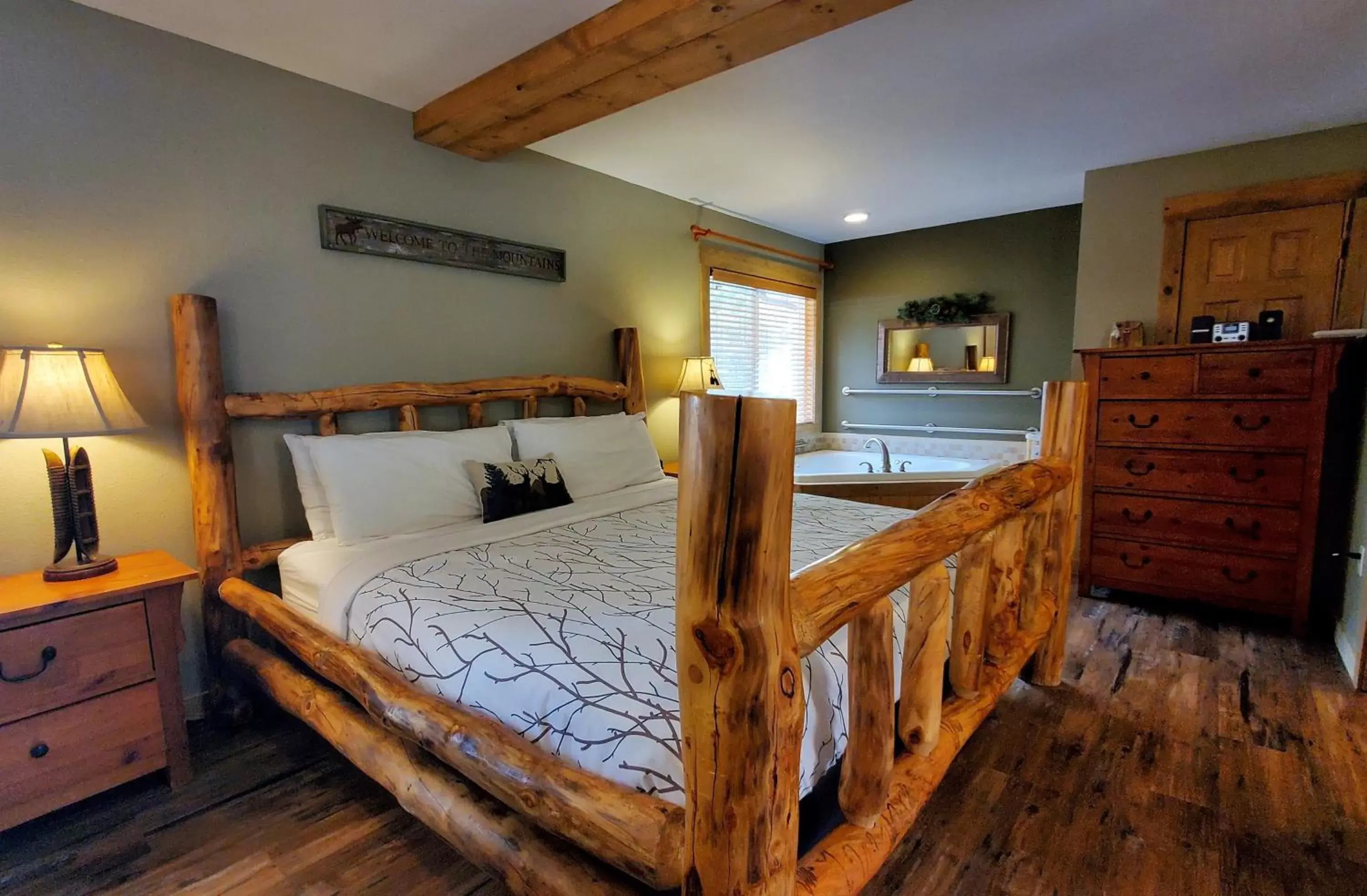 Bed in The Inn on Fall River & Fall River Cabins