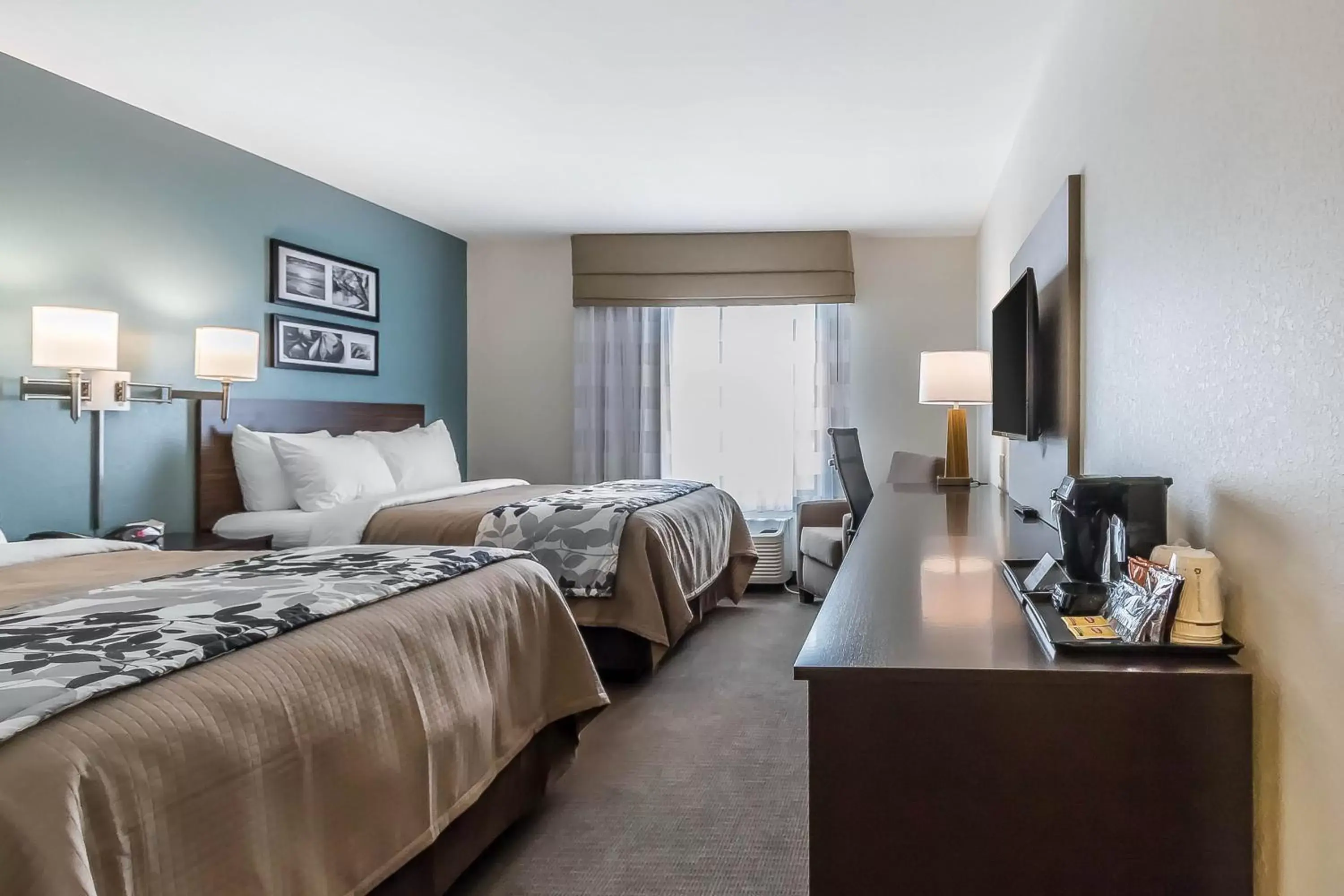 Bedroom in Sleep Inn & Suites O'Fallon MO - Technology Drive