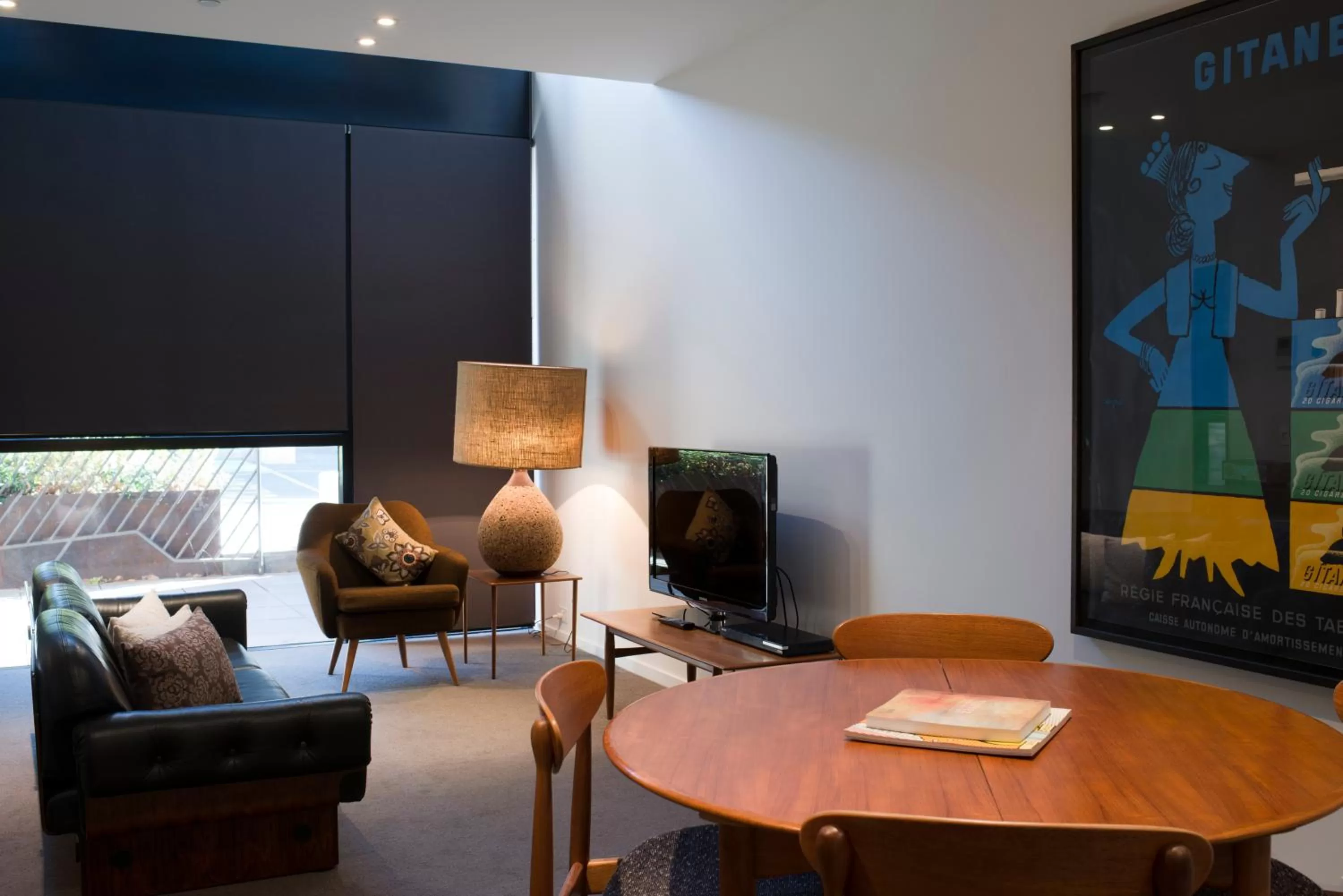 Communal lounge/ TV room in Nishi Apartments Eco Living by Ovolo