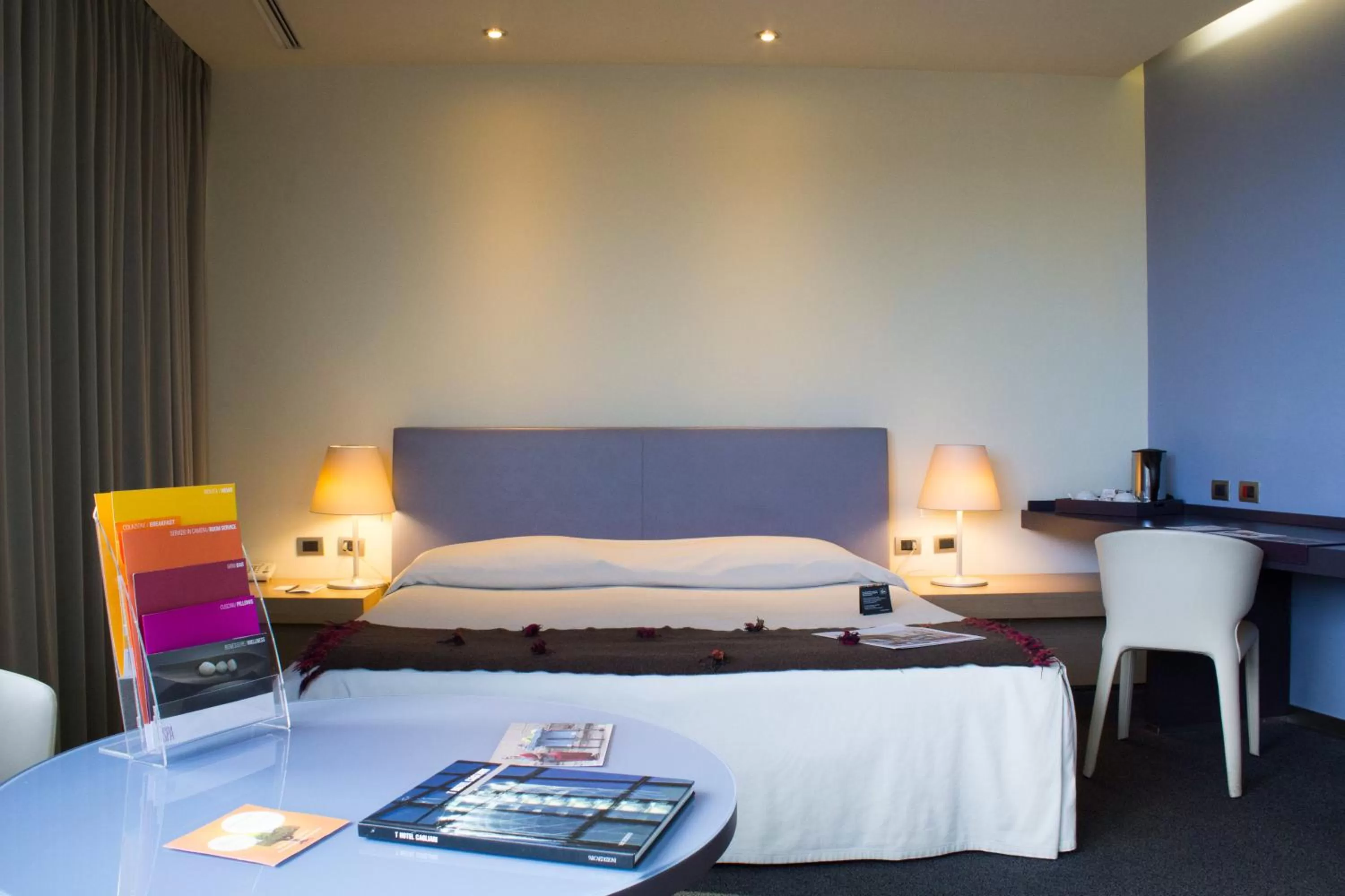 Bedroom, Bed in UNA HOTELS T Hotel Cagliari