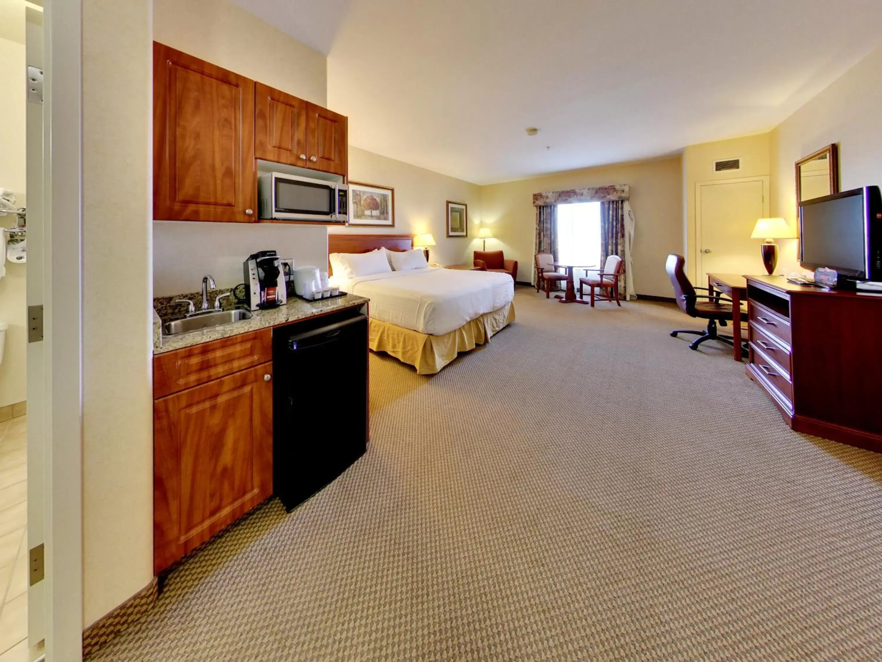 Photo of the whole room, Kitchen/Kitchenette in Holiday Inn Express Hotel & Suites - Edmonton International Airport, an IHG Hotel