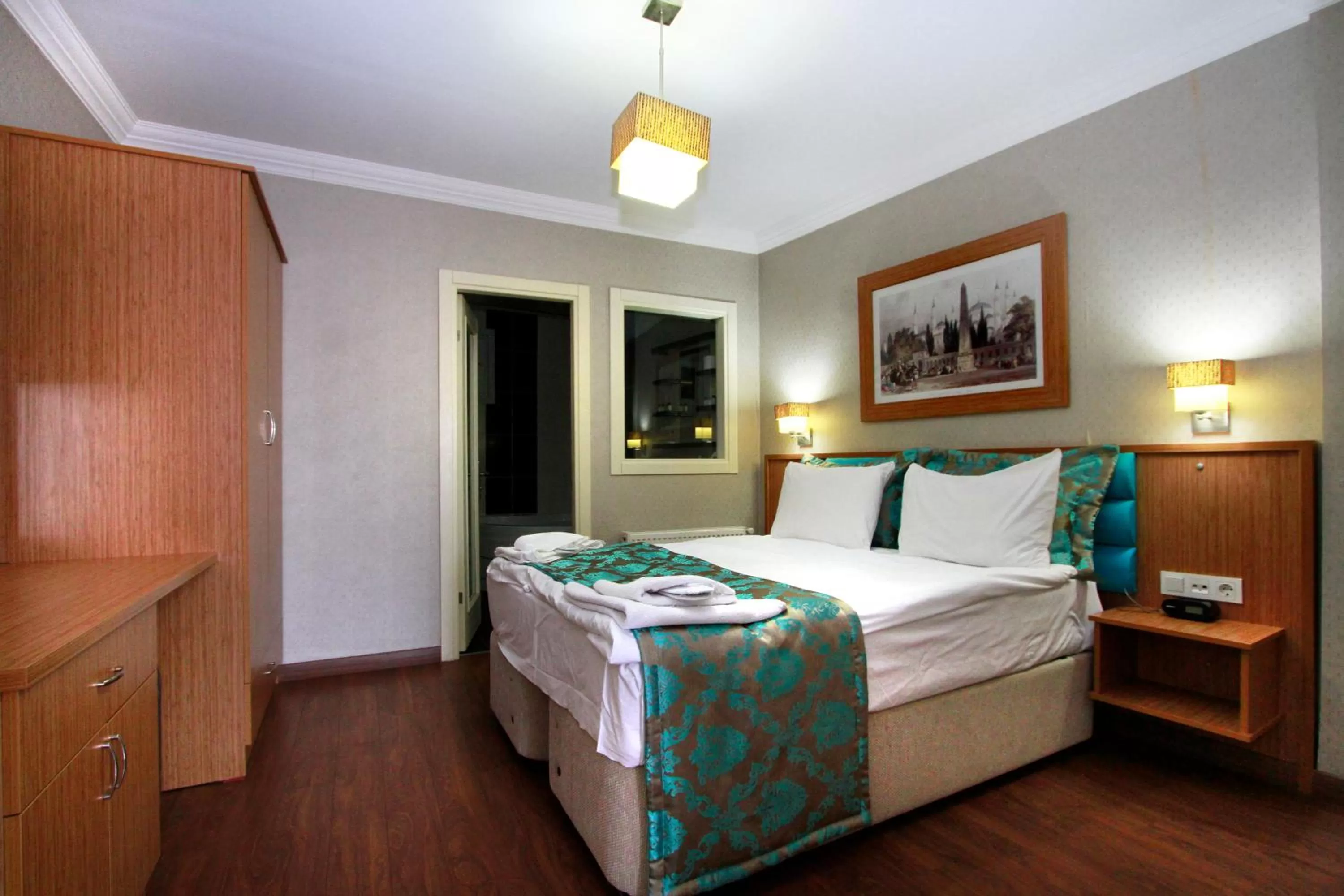 Bed in Agora Boutique Hotel & Bistro