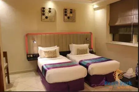 Bed in Pearl Executive Hotel Apartments