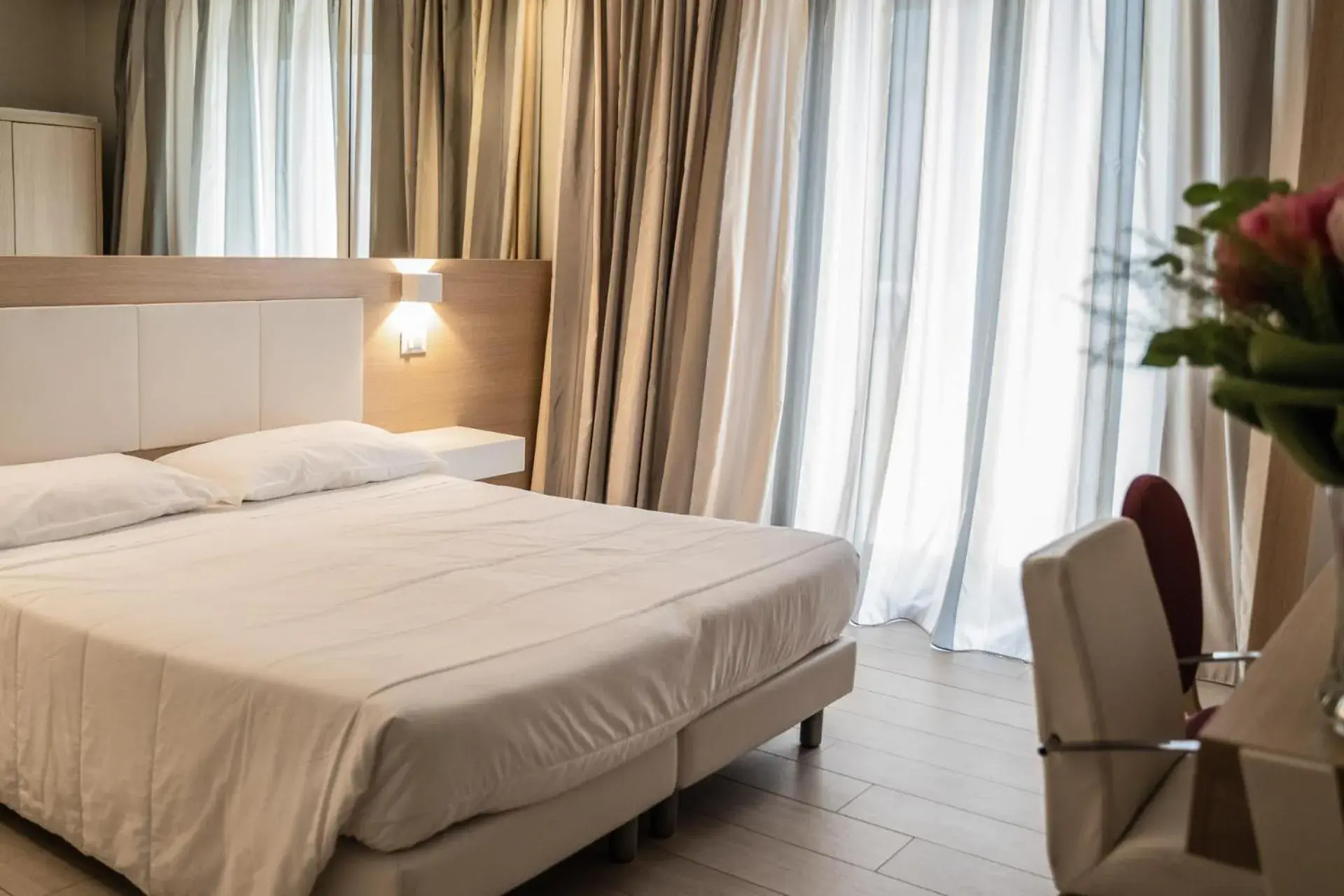 Bed in Hotel Mediterraneo