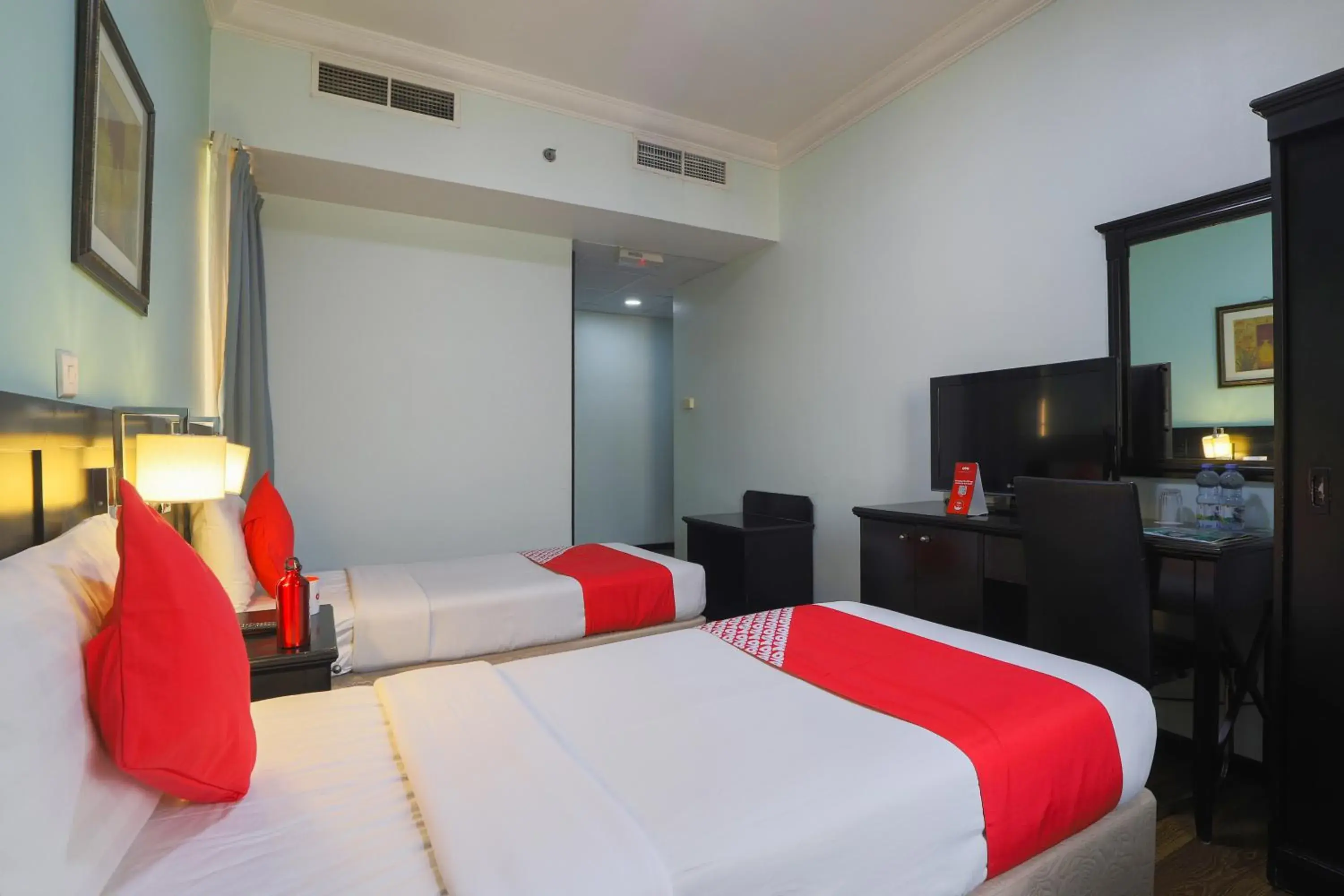 Bedroom, Bed in OYO 367 Eureka Hotel
